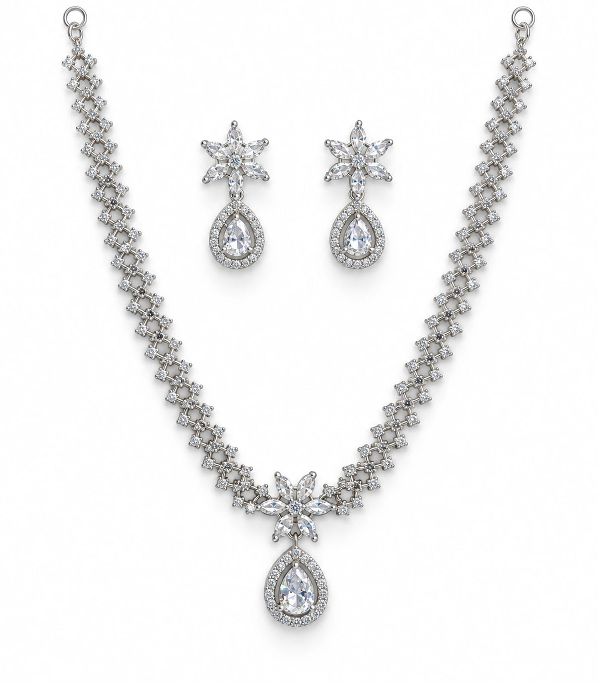 Silver clear star teardrop necklace with matching earring pair on white