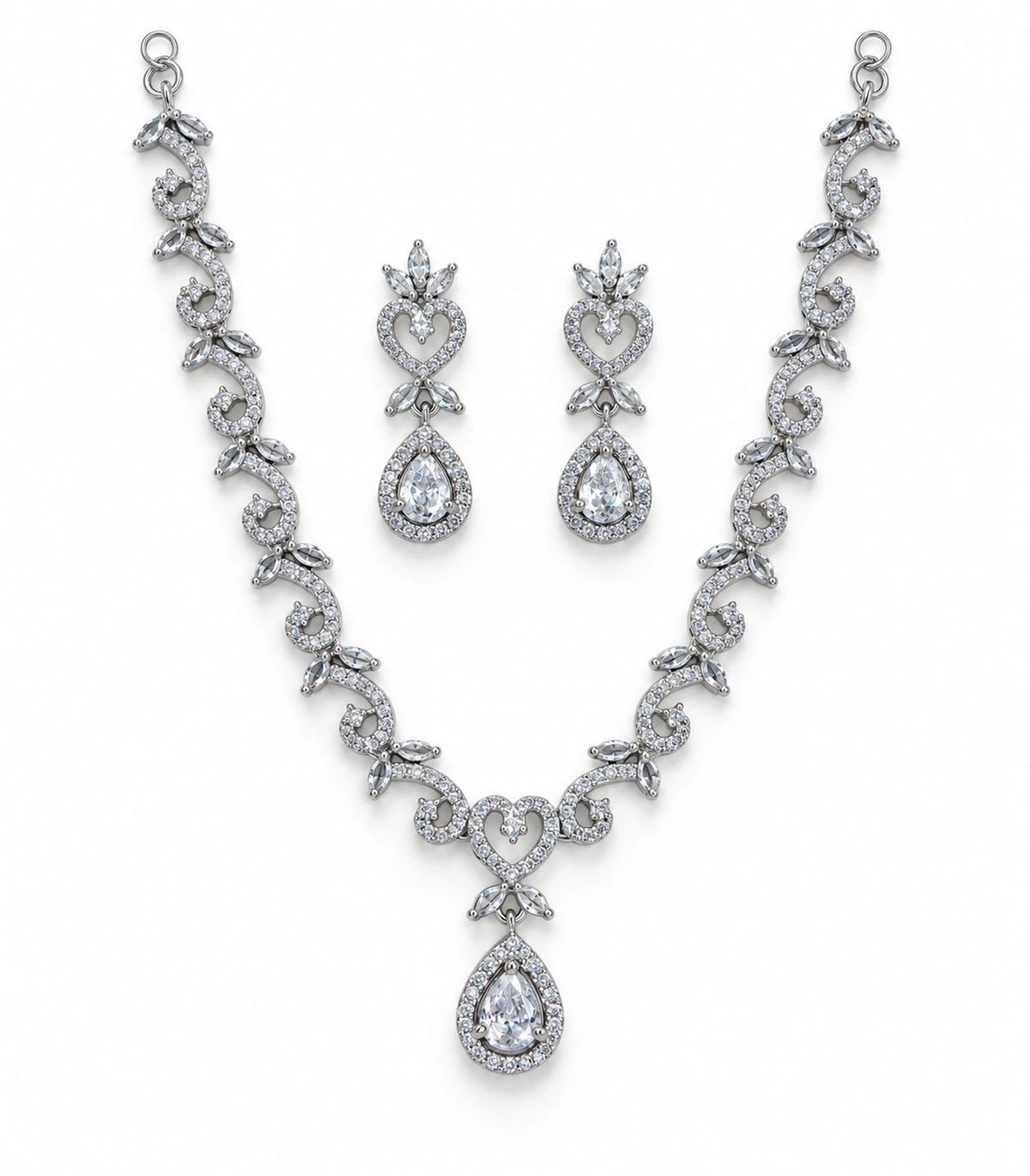 Silver-tone clear scrolling heart and teardrop necklace with both matching drop earrings on white background