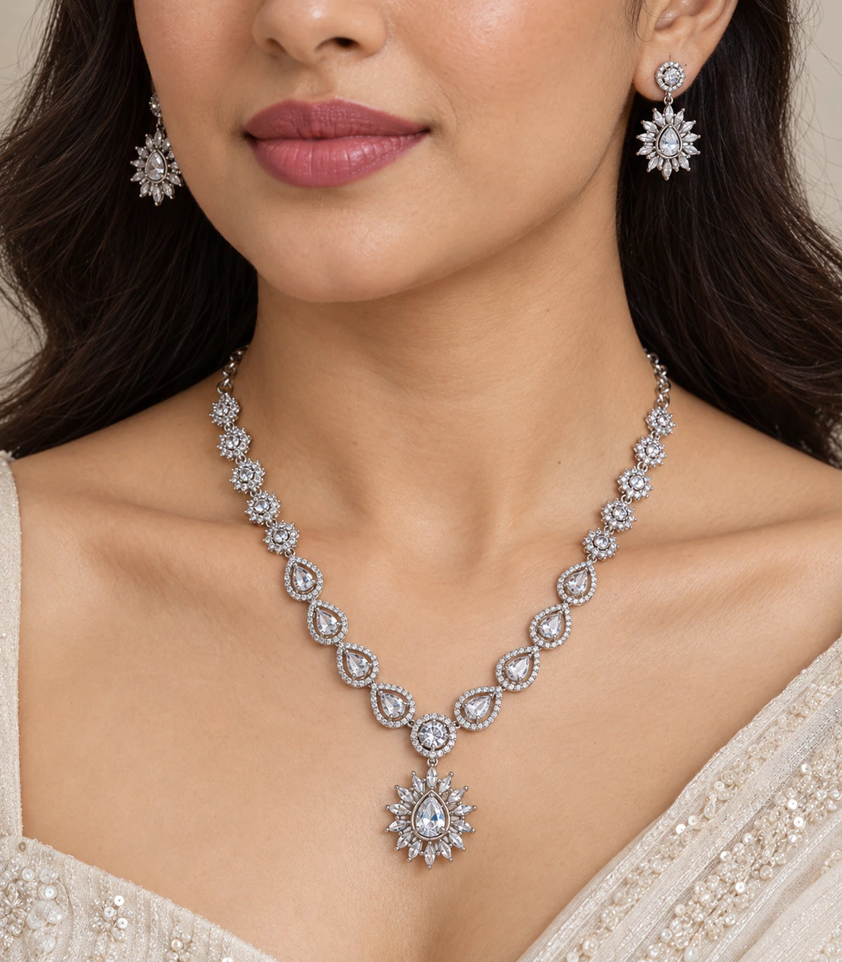 Close view of the Silver Clear Teardrop Sunburst Crystal Necklace Set worn naturally