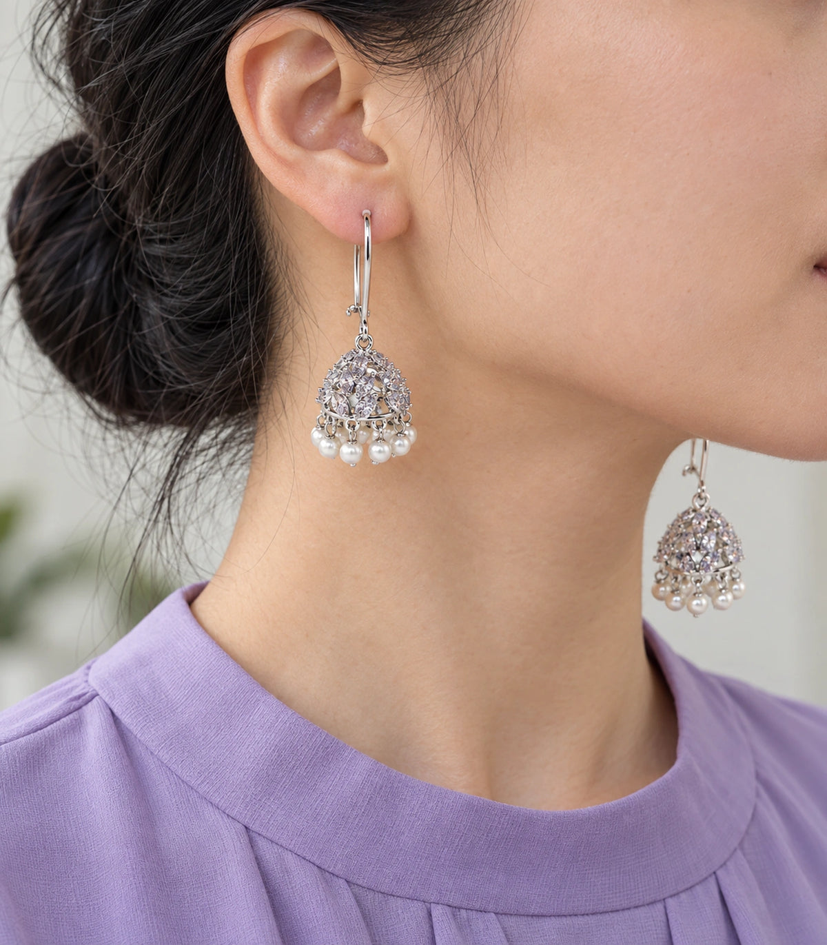 JIMIKI Crystal Leaf Pearl Hoop Jhumka Earrings - Silver close-up of earring worn on the ear #color_silver