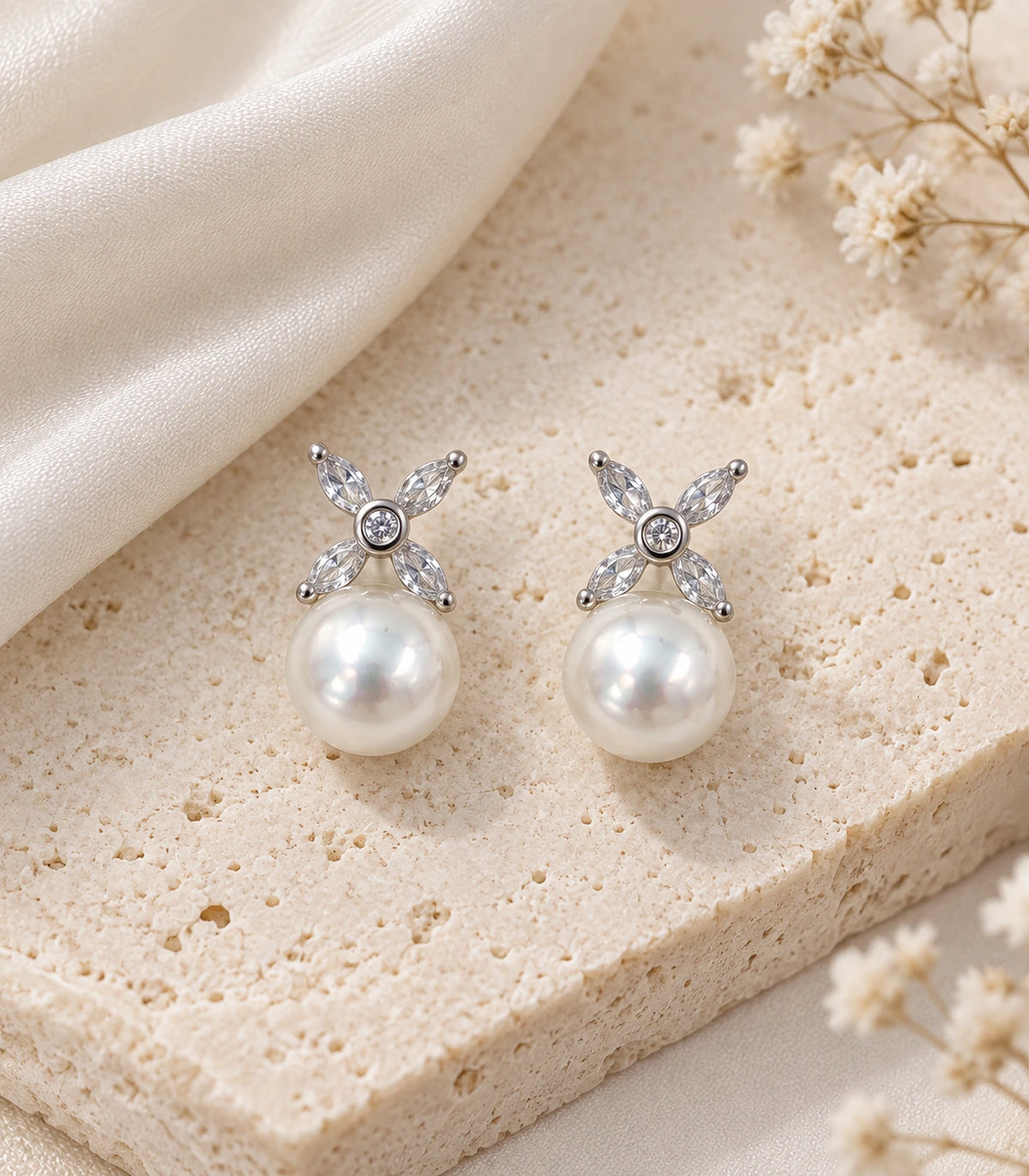 JIMIKI Silver Crystal Petal Pearl Stud Earrings in Silver - editorial flatlay #color_silver