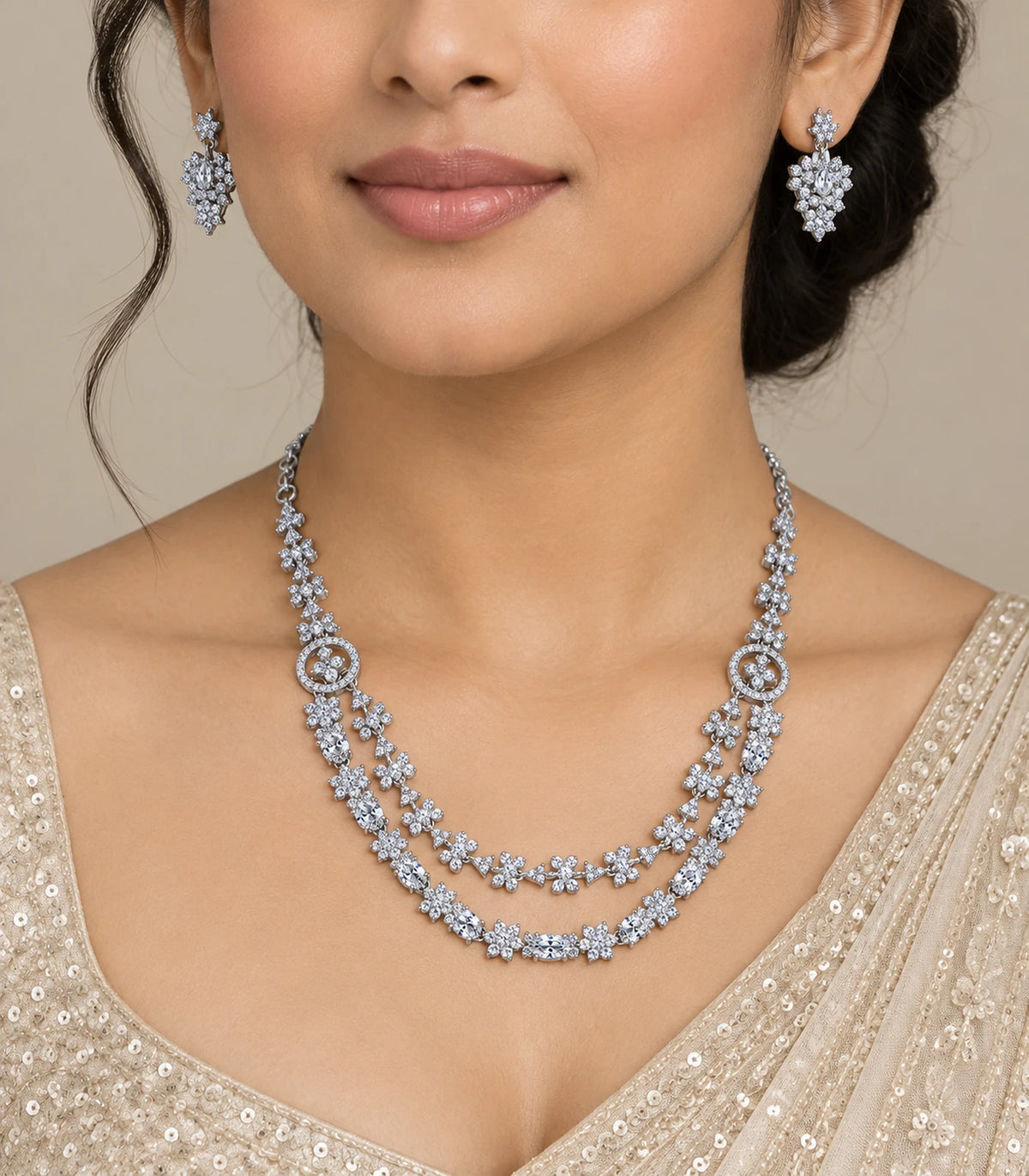Silver-tone double-layer floral crystal necklace and matching earrings worn together