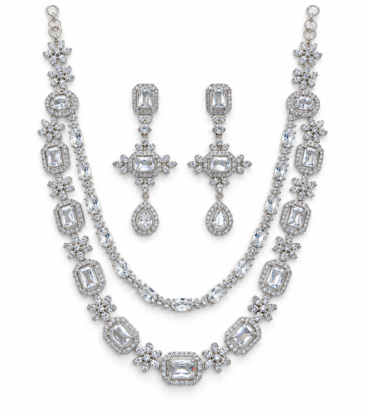 Silver-tone double-layer geometric necklace with two matching drop earrings on white