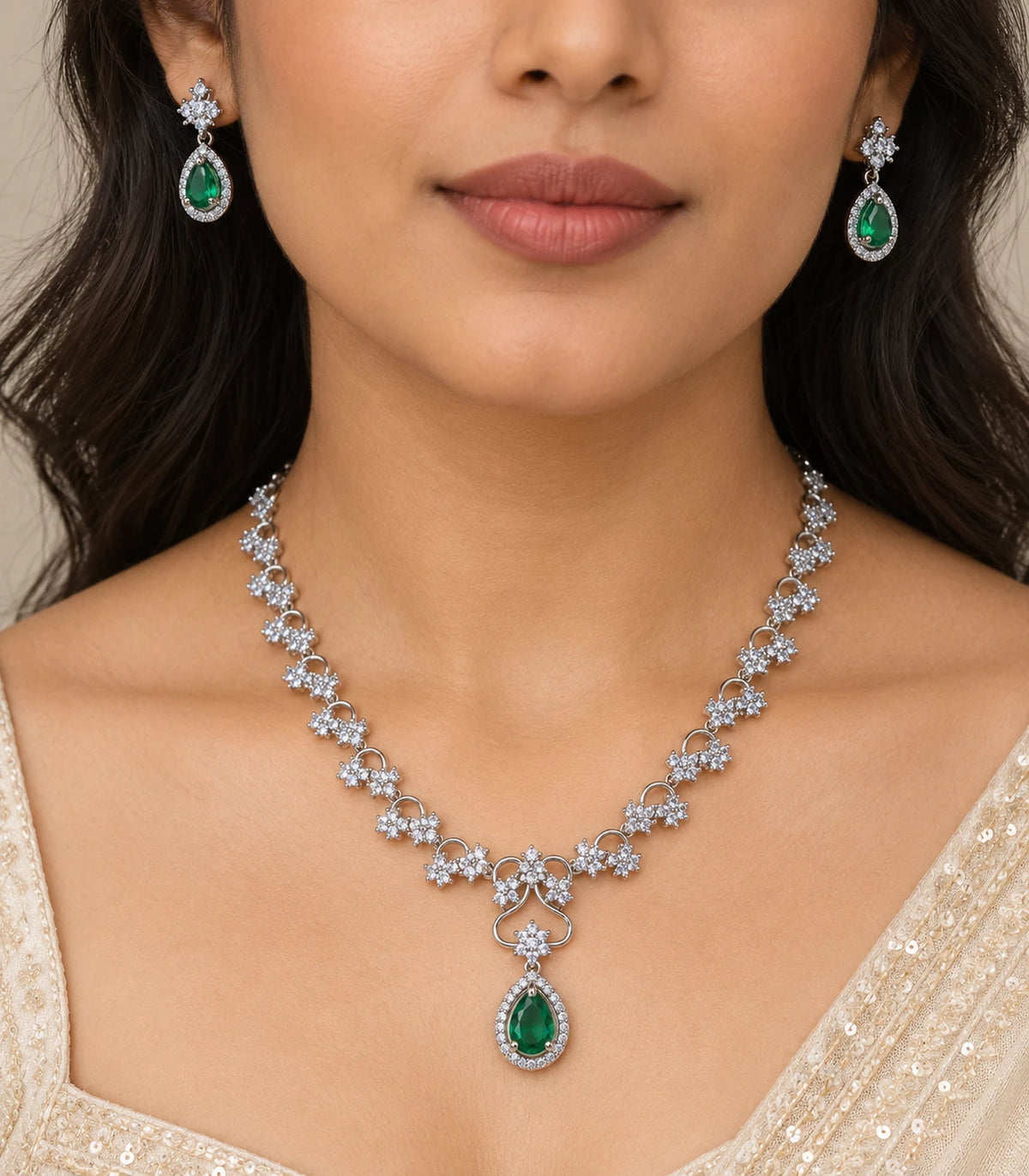 Closer worn view of Silver Emerald Teardrop Crystal Necklace Set