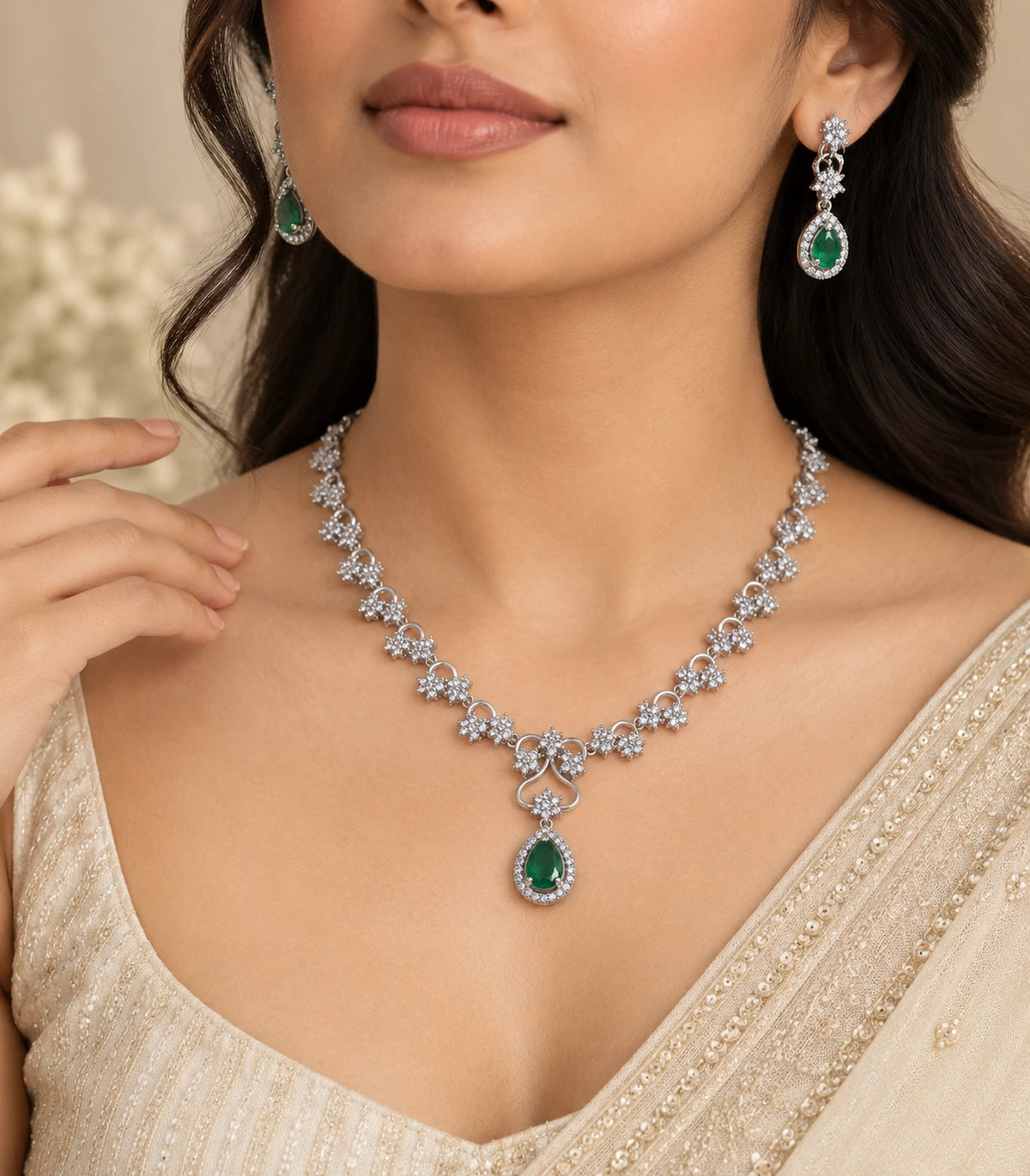 Three-quarter worn view of Silver Emerald Teardrop Crystal Necklace Set