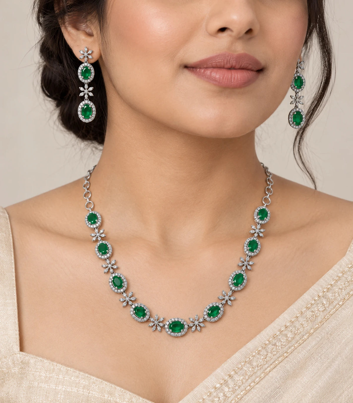 Silver Emerald Oval Floral Crystal Necklace Set worn with an ivory outfit