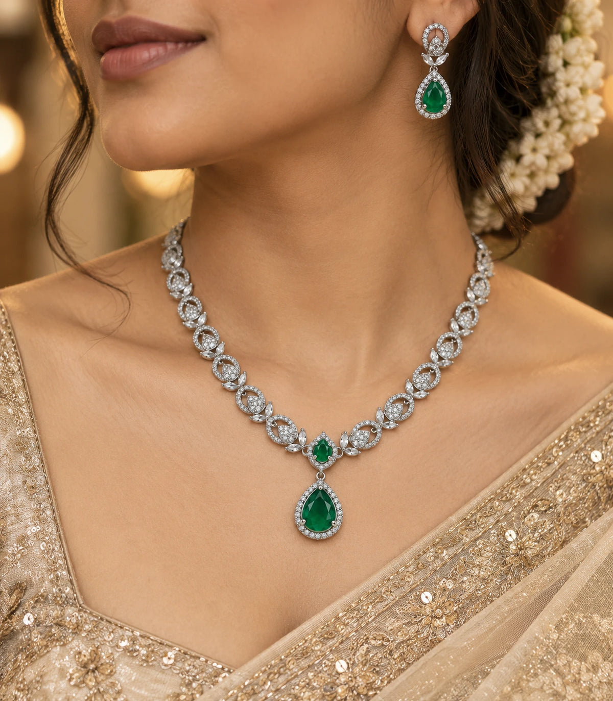 Silver Emerald Teardrop Crystal Necklace Set styled with a gold-toned outfit