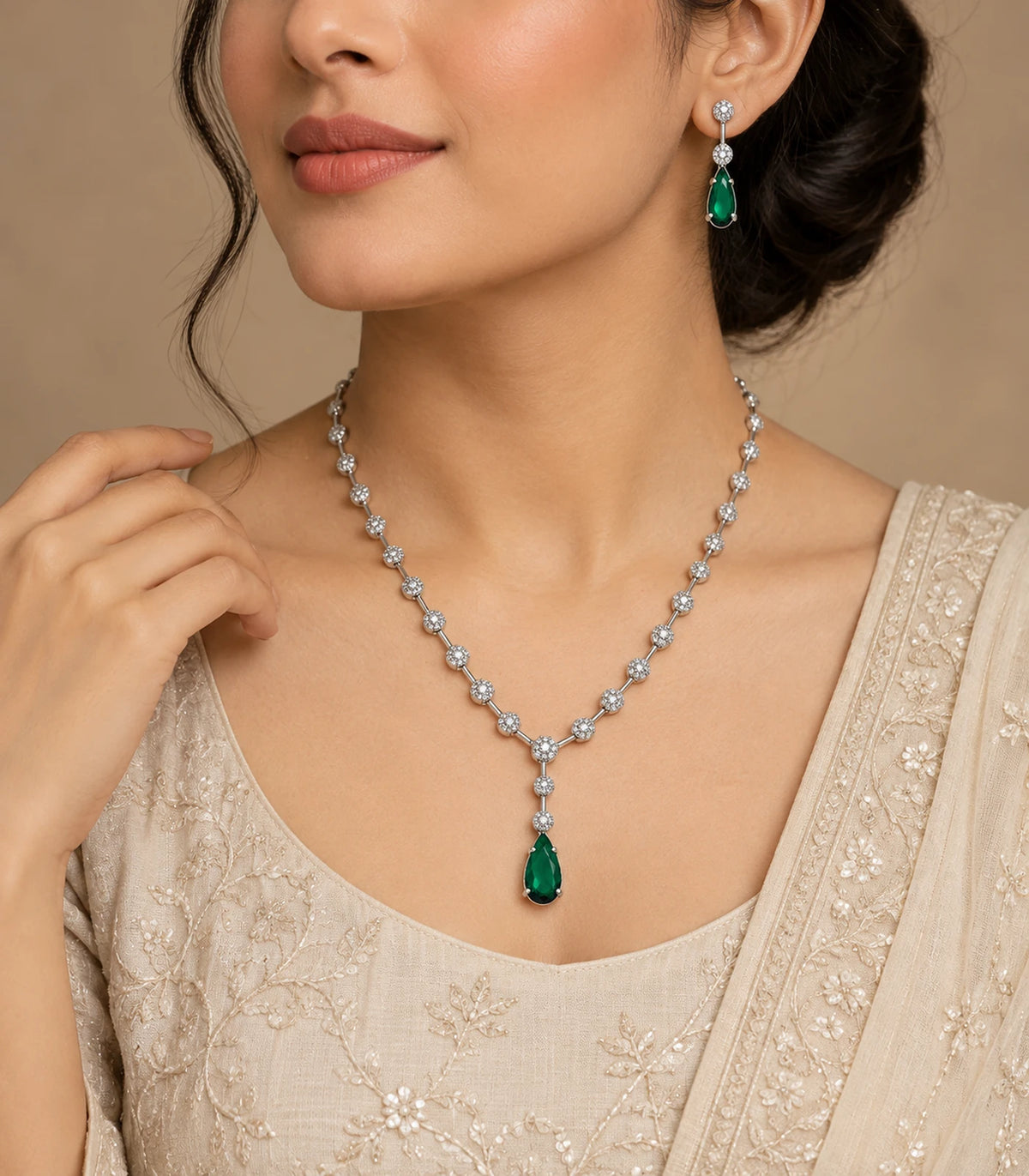 Silver Green Teardrop Necklace Set worn with an embroidered neutral outfit
