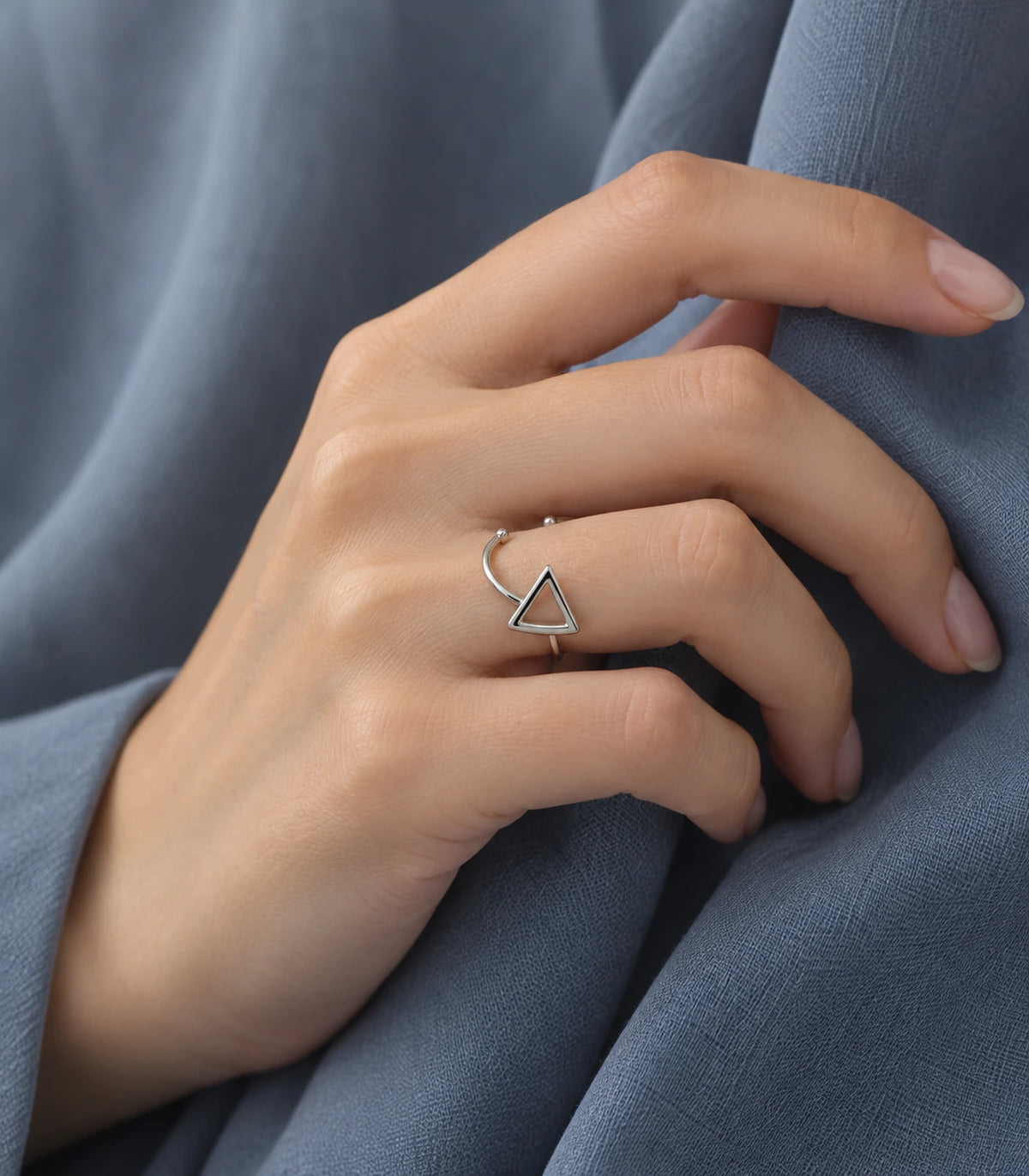 Silver Hollow Triangle Open Ring styled with blue fabric