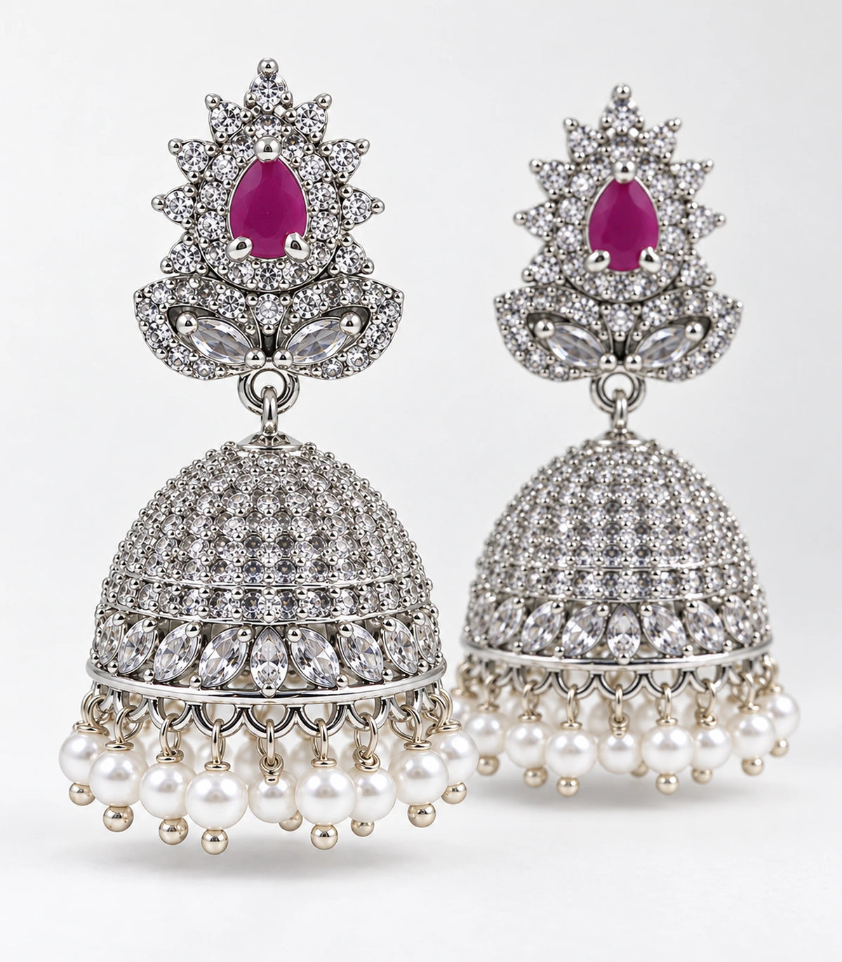 Silver Magenta Floral Pearl Fringe Jhumka Earrings — editorial flatlay