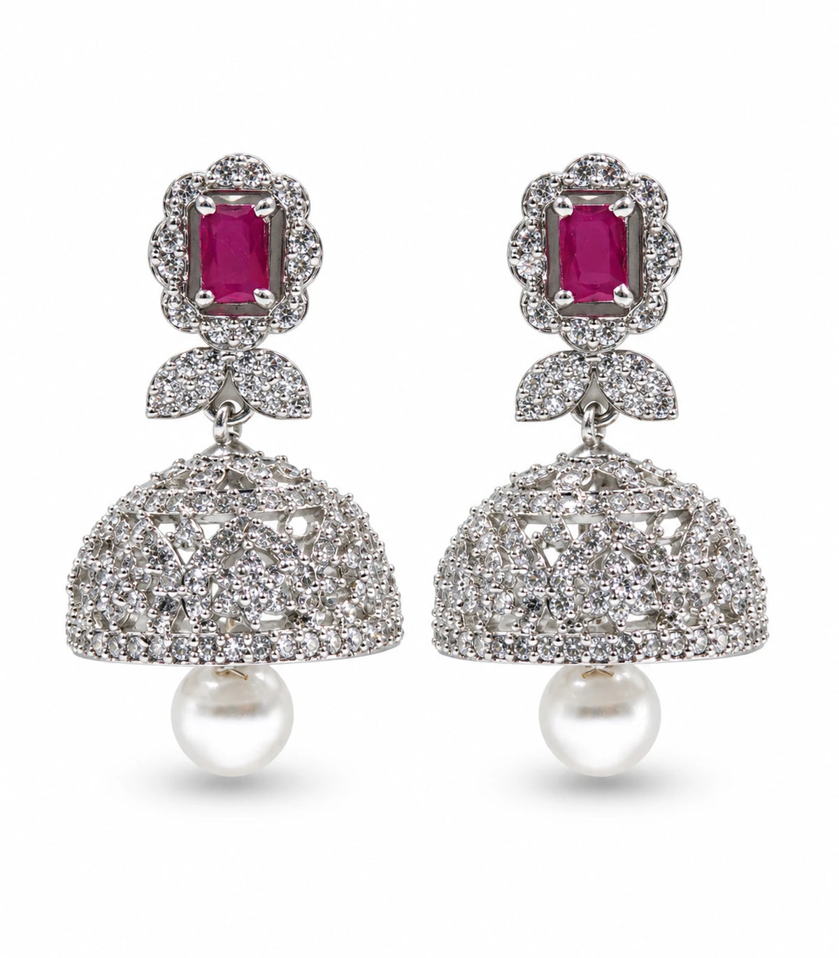 Silver-tone magenta rectangular bow pearl-style jhumka earrings, matching pair on white
