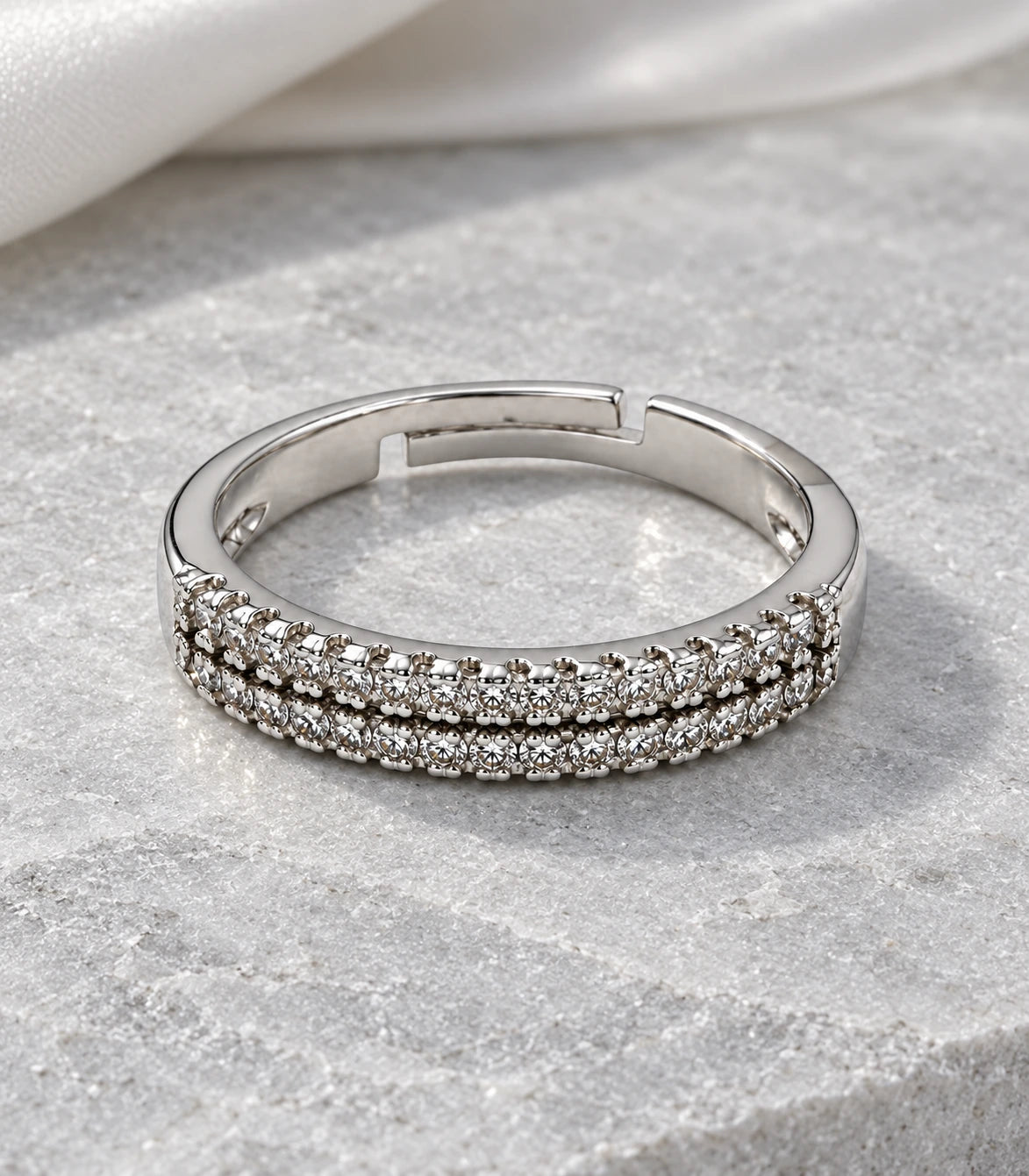 JIMIKI Silver Multi-Row Crystal Adjustable Ring in Silver - editorial flatlay #color_silver