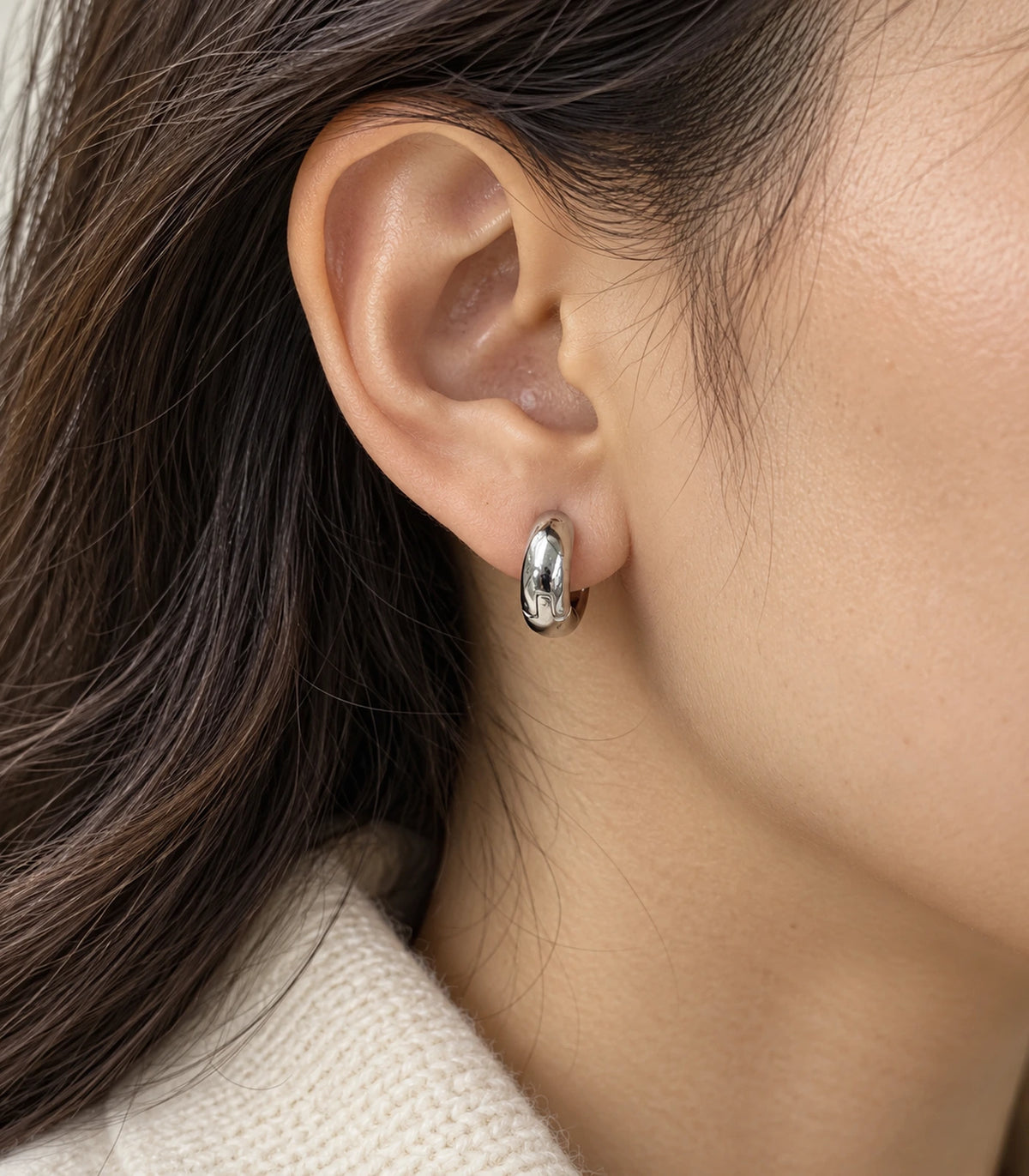 JIMIKI Silver Organic Polished Huggie Earrings — editorial worn styling #color_silver
