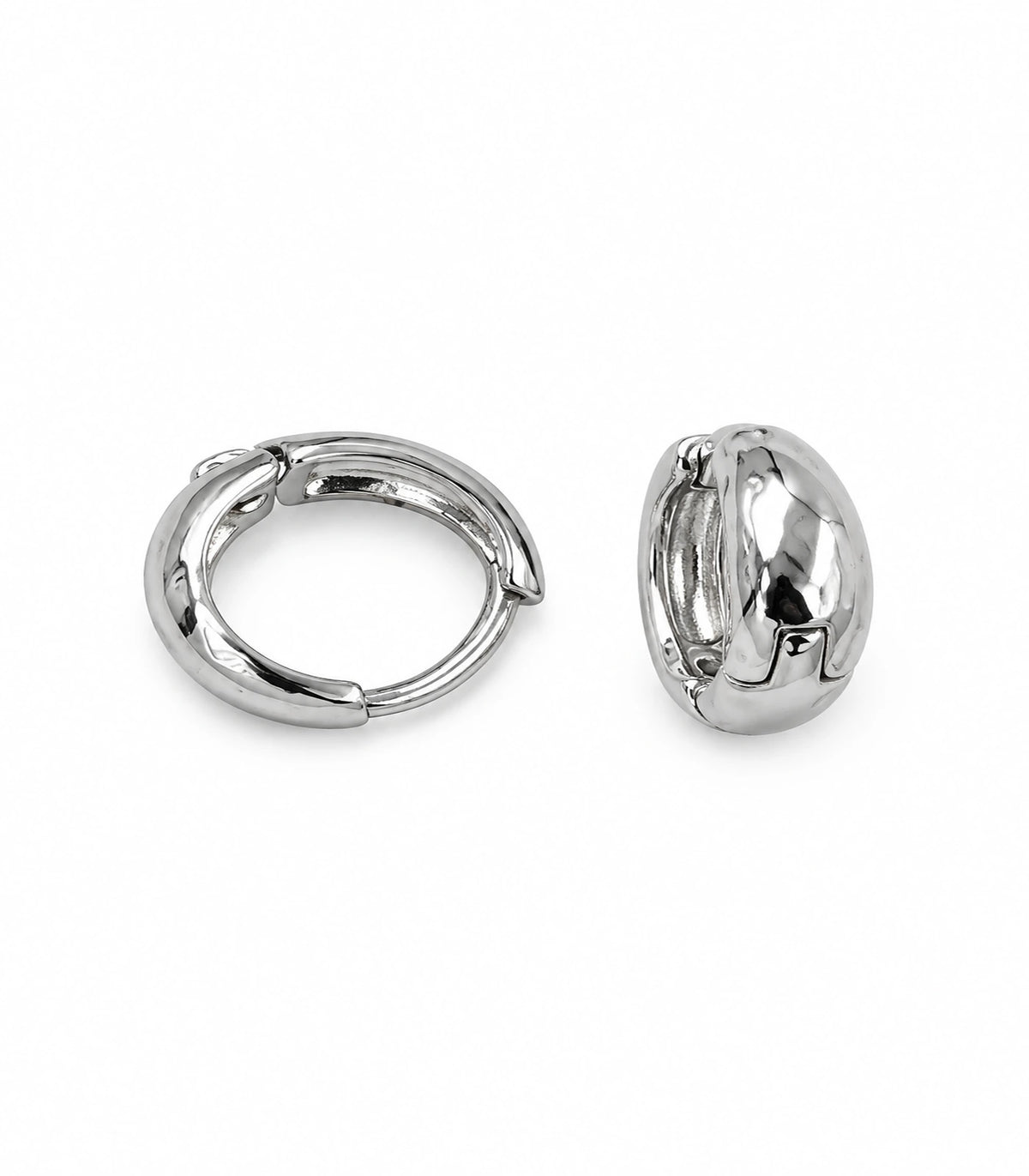 JIMIKI Silver Organic Polished Huggie Earrings — pair on white background #color_silver