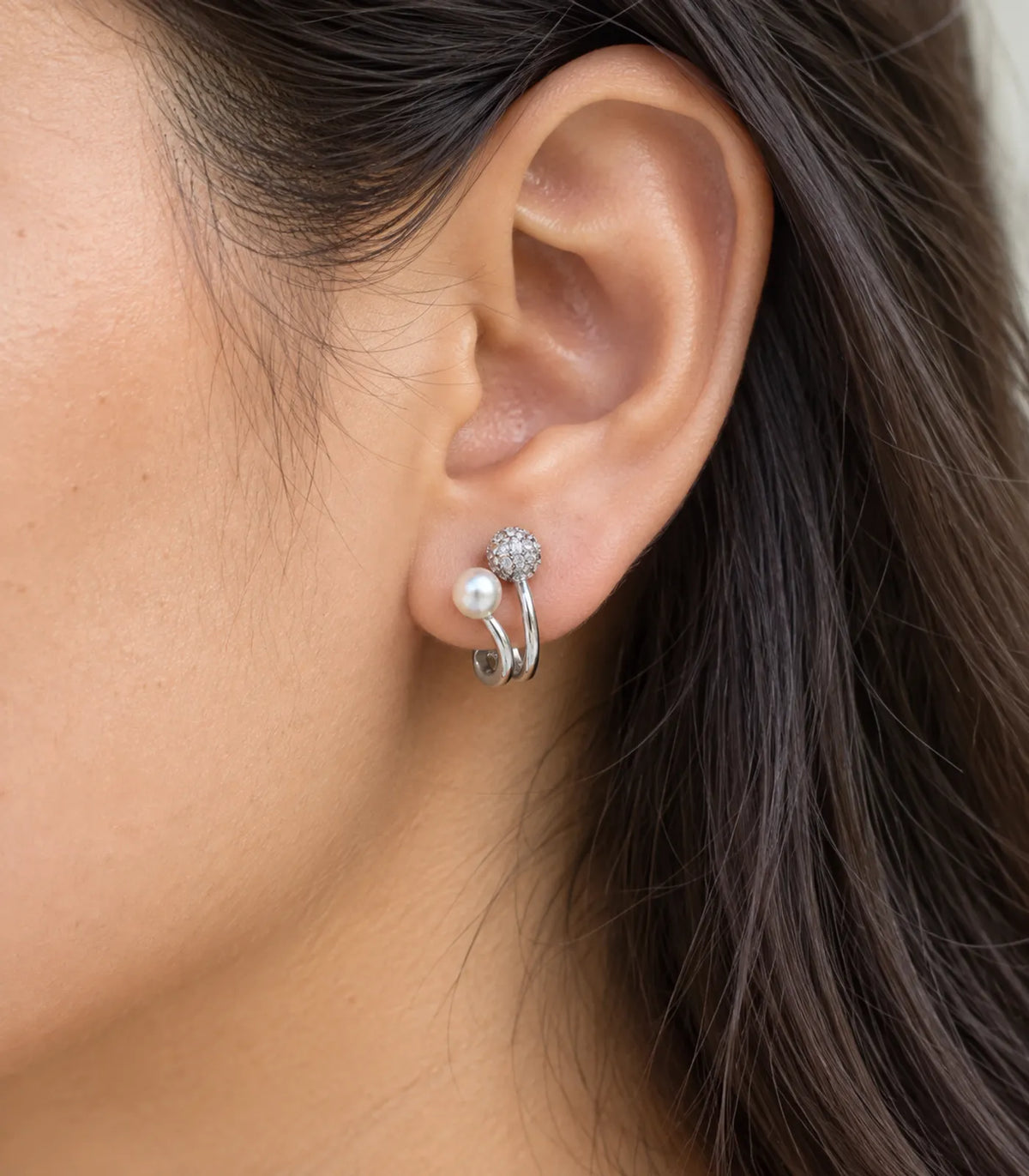 JIMIKI Silver Pearl Pave Disc Sculptural Earrings — worn close-up detail #color_silver