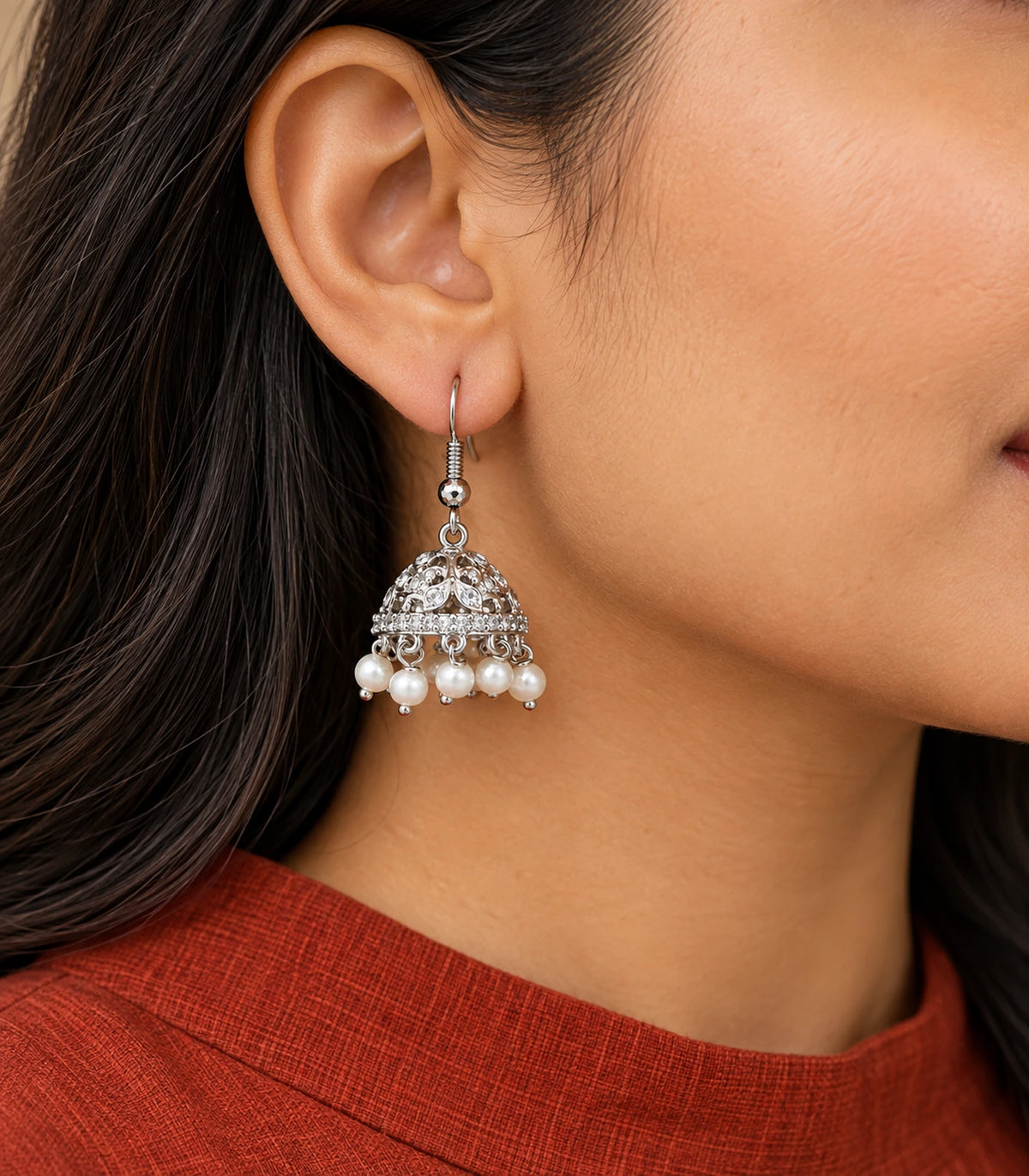 JIMIKI Silver Round Crystal Openwork Jhumka Earrings - Earring worn with a rust outfit #color_silver