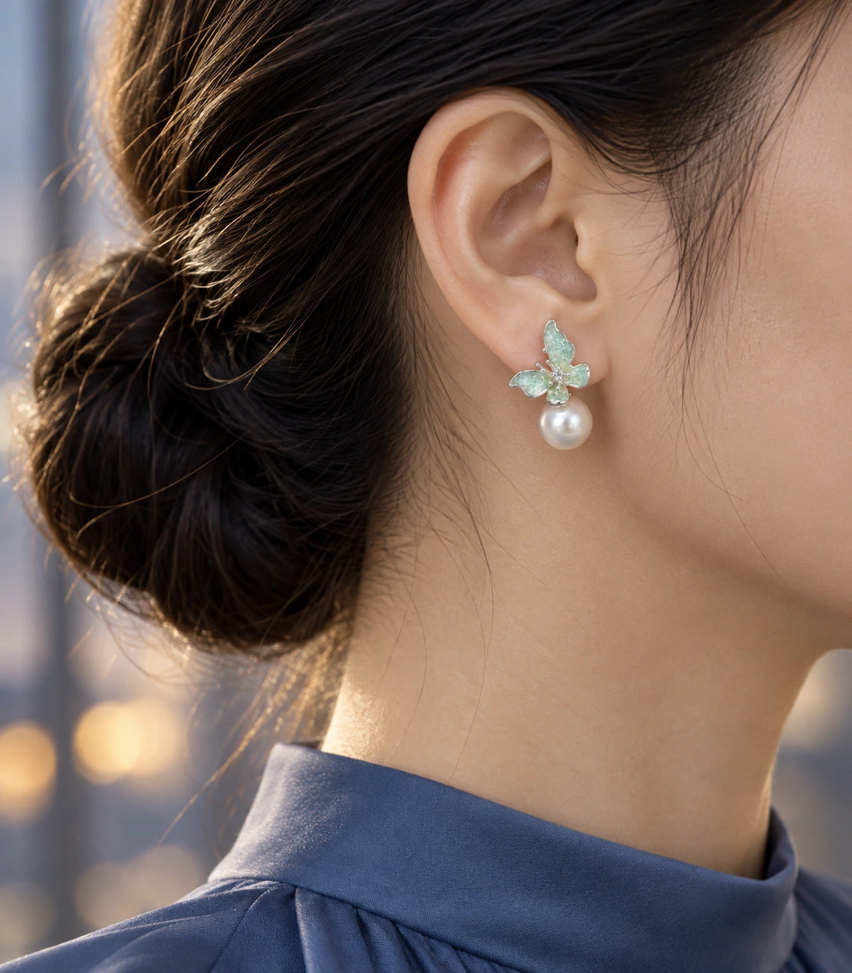 JIMIKI Asymmetric Butterfly Pearl-Style Earrings in Mint / silver-tone / white, editorial model view #color_mint / silver-tone / white
