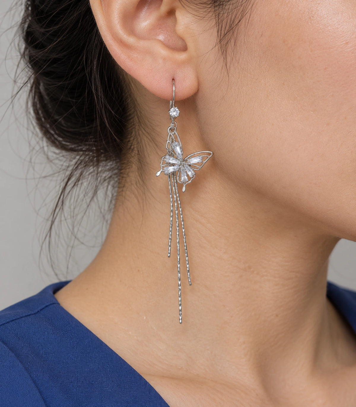 JIMIKI Silver Tone Baguette Butterfly Three Chain Earring Pair in Silver-tone, close-up detail