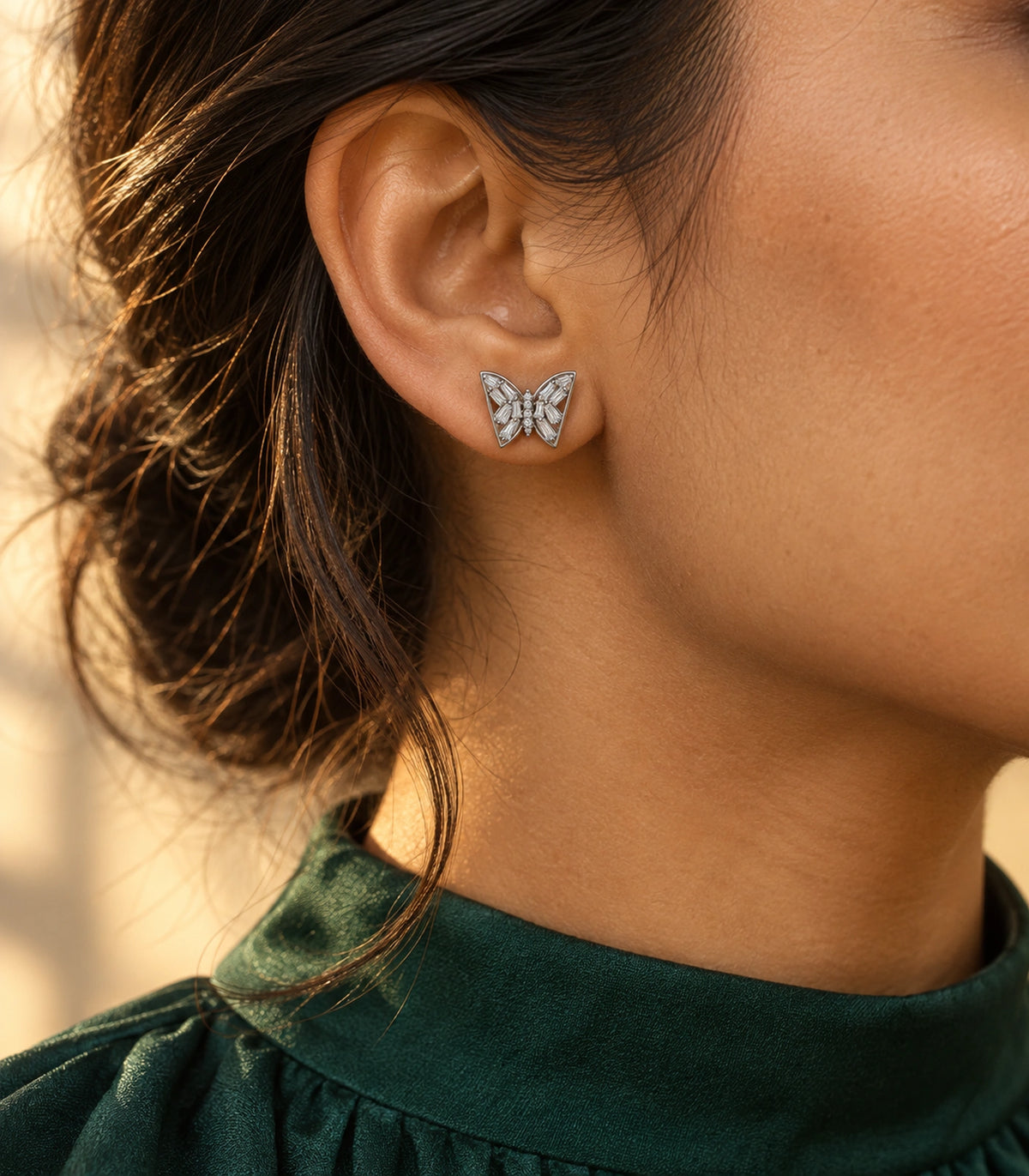 JIMIKI Silver-Tone Baguette Wing Butterfly Stud Earrings in Silver-tone, editorial model view