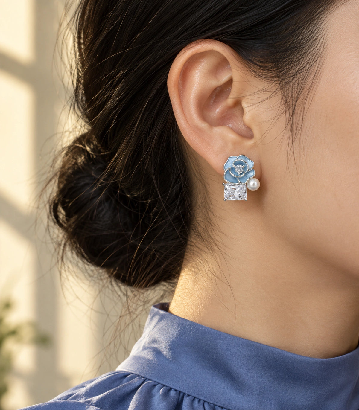 JIMIKI Flower Pearl Square Crystal Stud Earring Pair in Silver tone / Blue, editorial model view #color_silver tone / blue