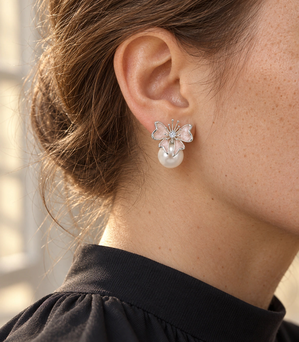 JIMIKI Butterfly Pearl Stud Earring Pair in Silver Tone / Blush, editorial model view #color_silver tone / blush