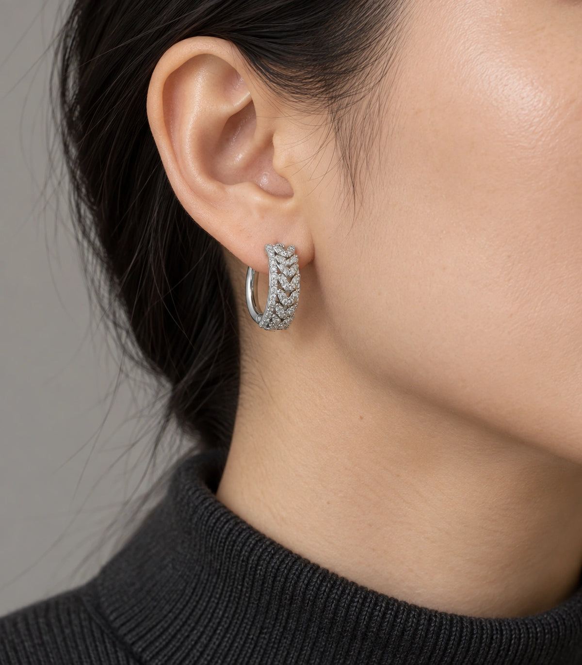 JIMIKI Crystal Chain Pattern Hoop Earring Pair in Silver tone/Clear, model wearing view #color_silver tone/clear