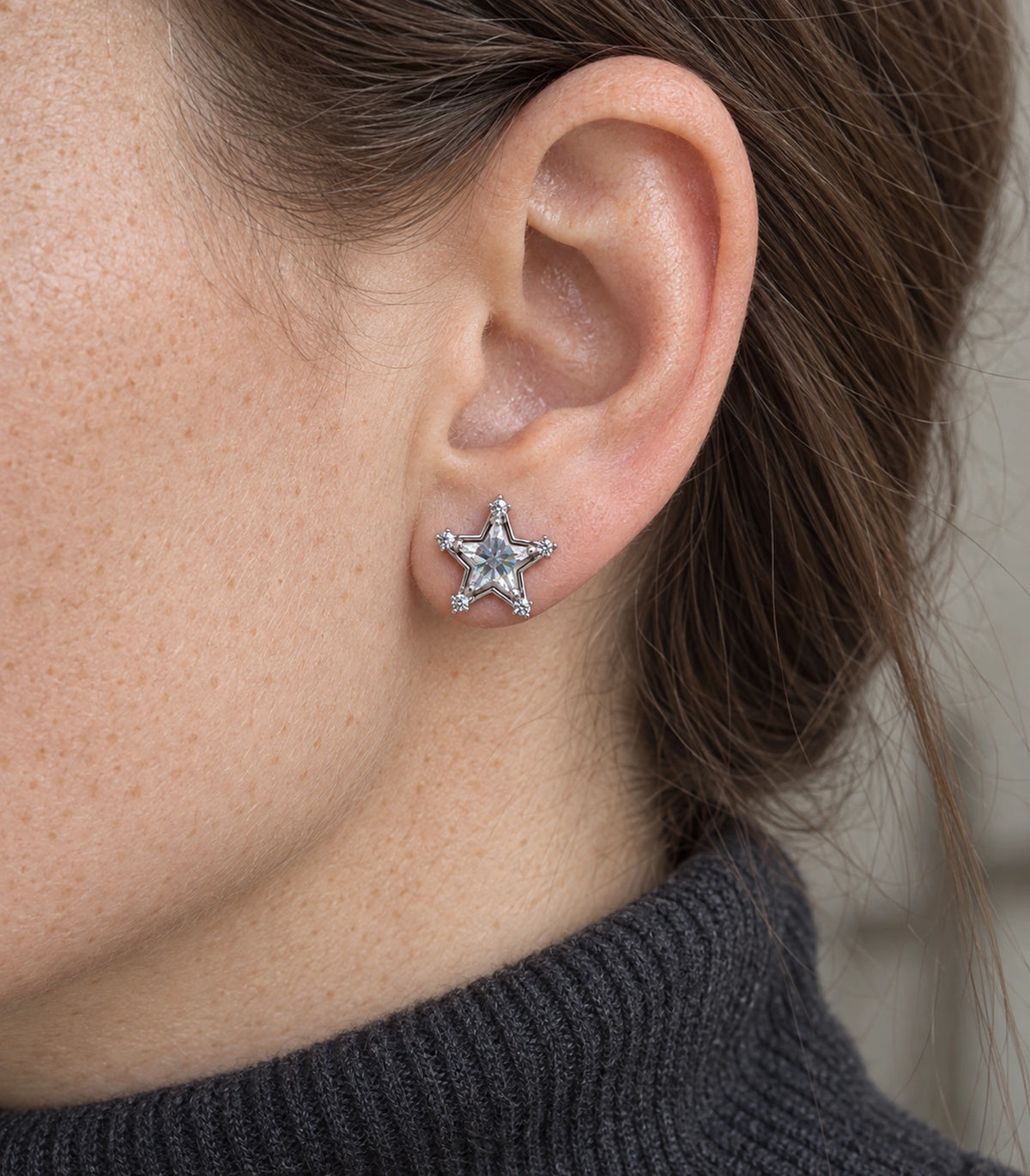 JIMIKI Crystal Star Stud Earring Pair in Silver tone, close-up detail #color_silver tone