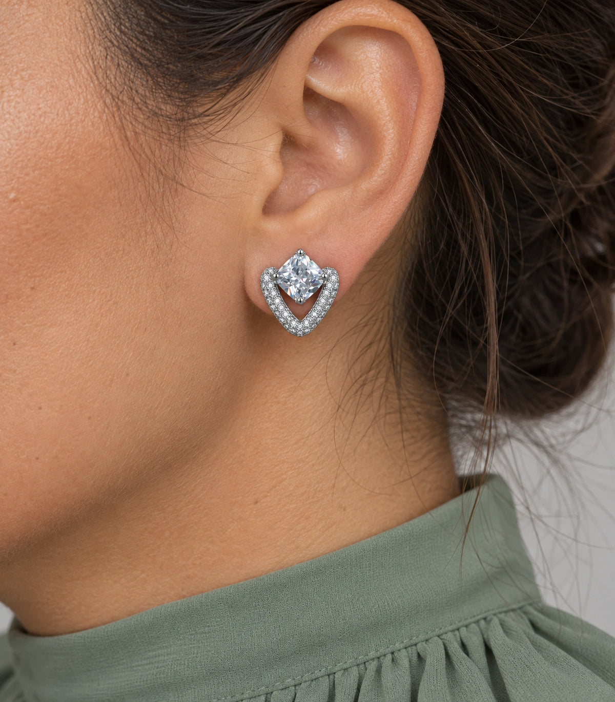 JIMIKI Silver Tone Clear Cushion Crystal Open Heart Stud Earring Pair in Silver-tone, close-up detail