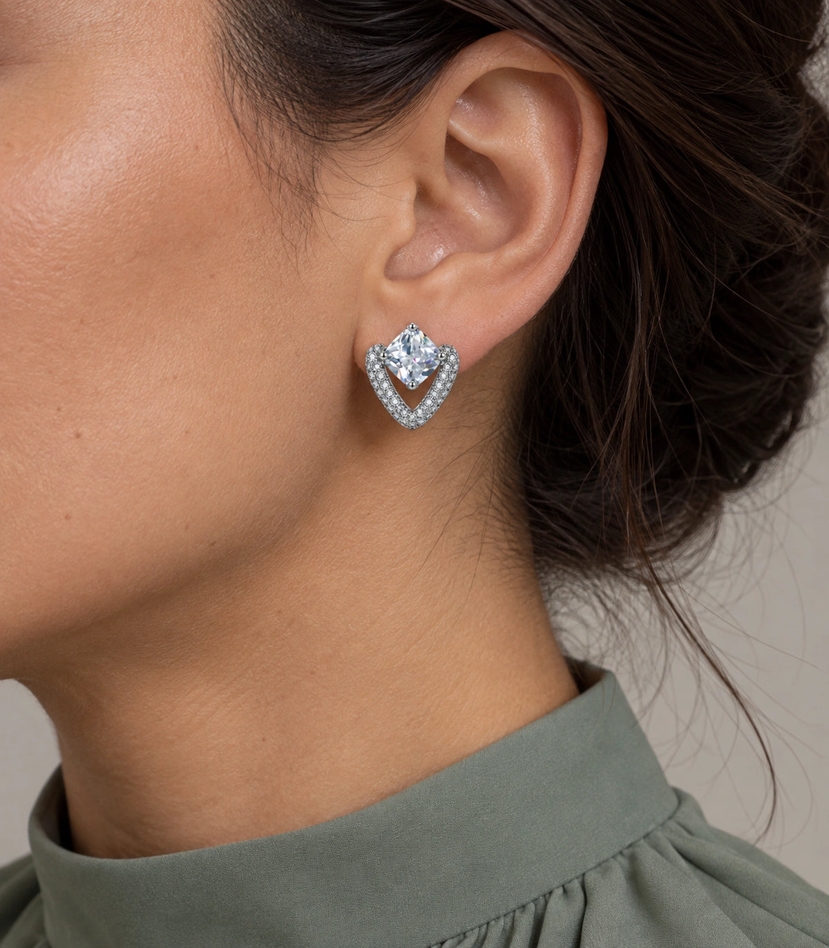 JIMIKI Silver Tone Clear Cushion Crystal Open Heart Stud Earring Pair in Silver-tone, model wearing view