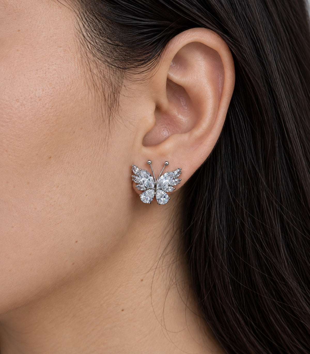JIMIKI Marquise Teardrop Butterfly Stud Earring Pair in Silver tone/Clear, close-up detail #color_silver tone/clear