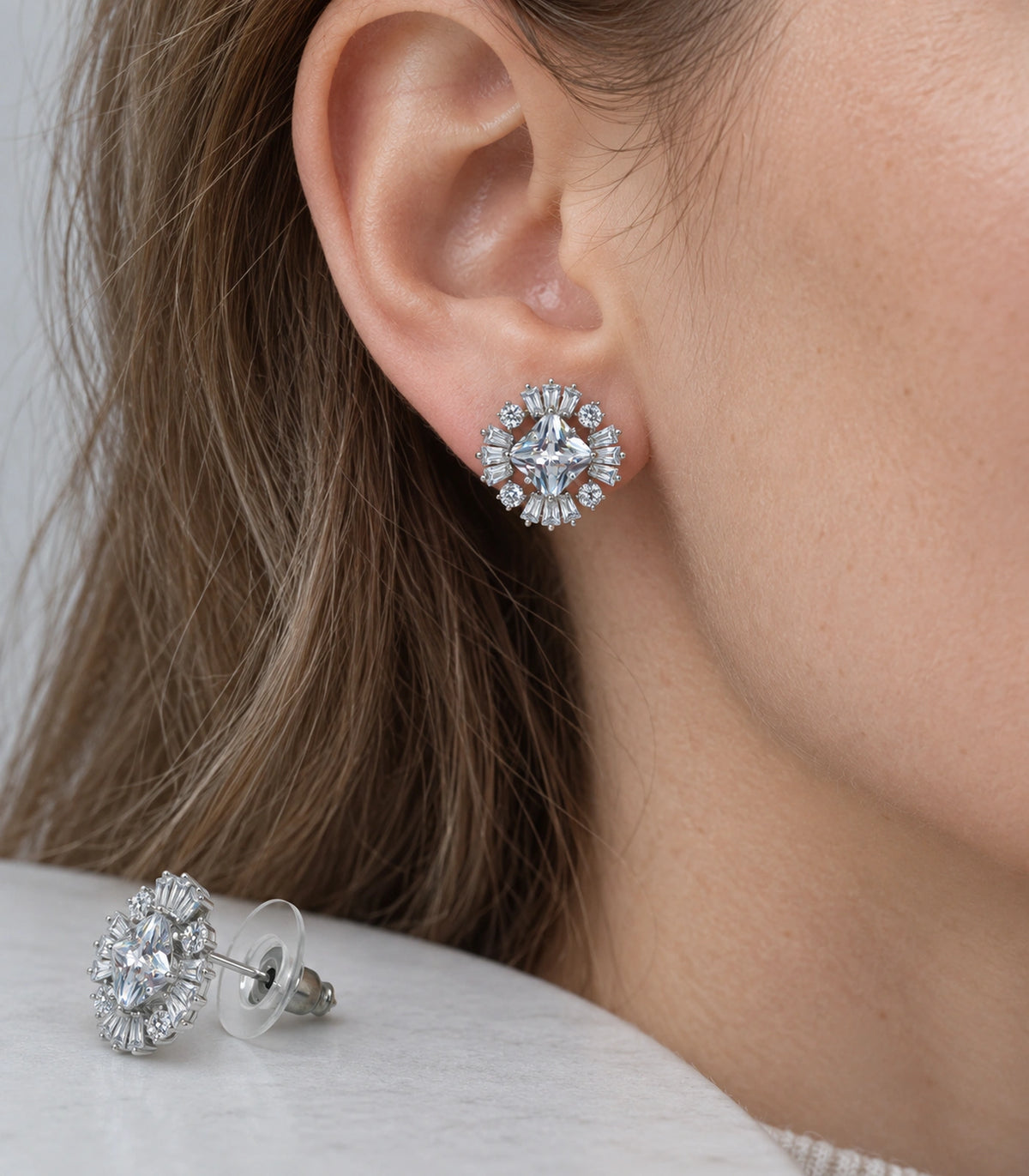 JIMIKI Star Crystal Baguette Halo Stud Earring Pair in Silver tone, close-up detail #color_silver tone