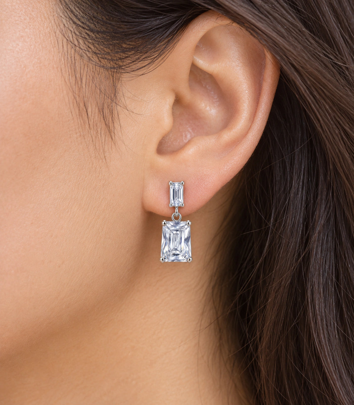 JIMIKI Silver Tone Clear Step Cut Two Stone Drop Earring Pair in Clear / Silver, close-up detail