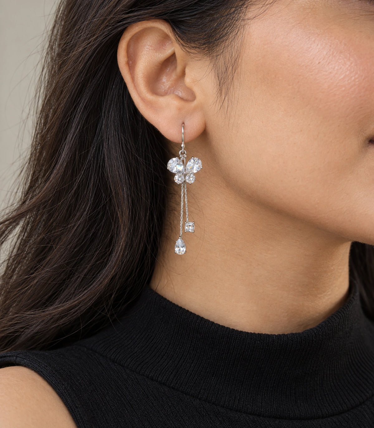 JIMIKI Silver Tone Crystal Butterfly Pear Square Chain Earring Pair in Silver-tone, model wearing view