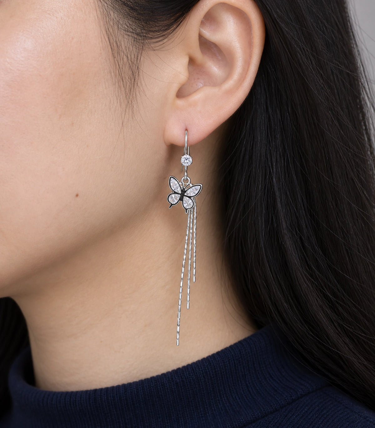 JIMIKI Silver Tone Crystal Butterfly Three Chain Earring Pair in Silver-tone, close-up detail