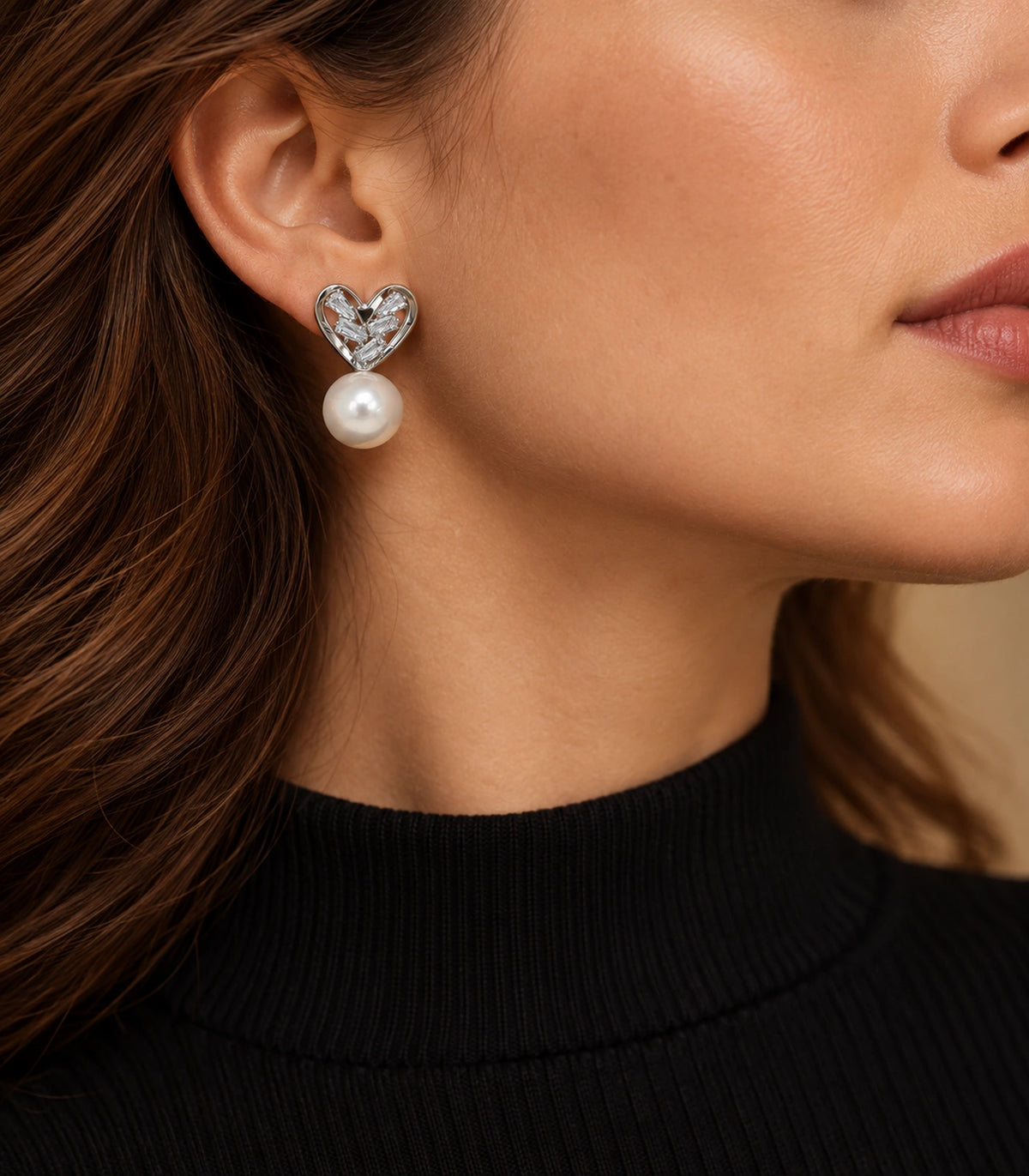 JIMIKI Silver-Tone Crystal Heart Pearl Drop Stud Earrings in Silver Tone, editorial model view