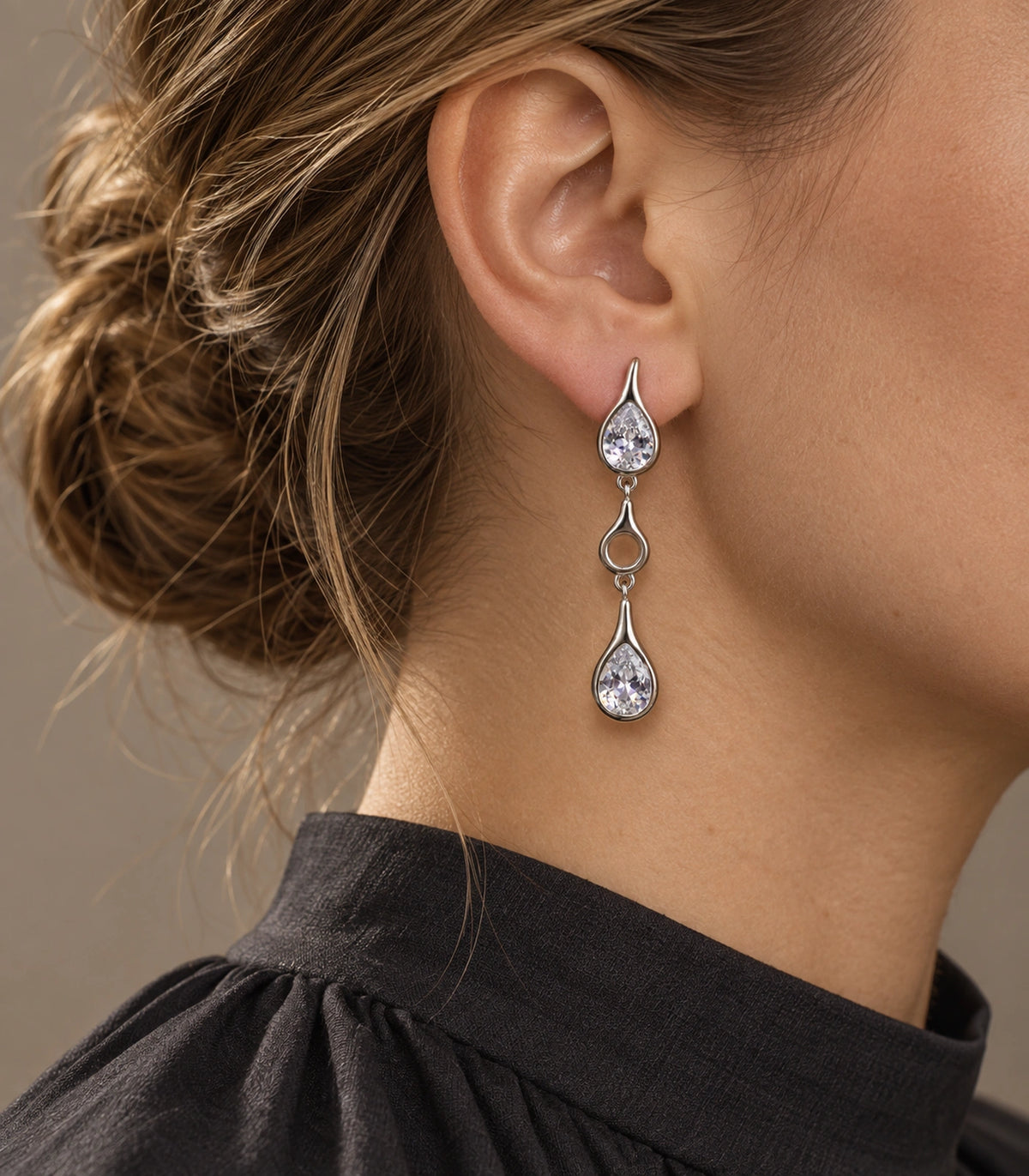 JIMIKI Crystal Teardrop Open Link Drop Earring Pair in Silver tone, editorial model view #color_silver tone