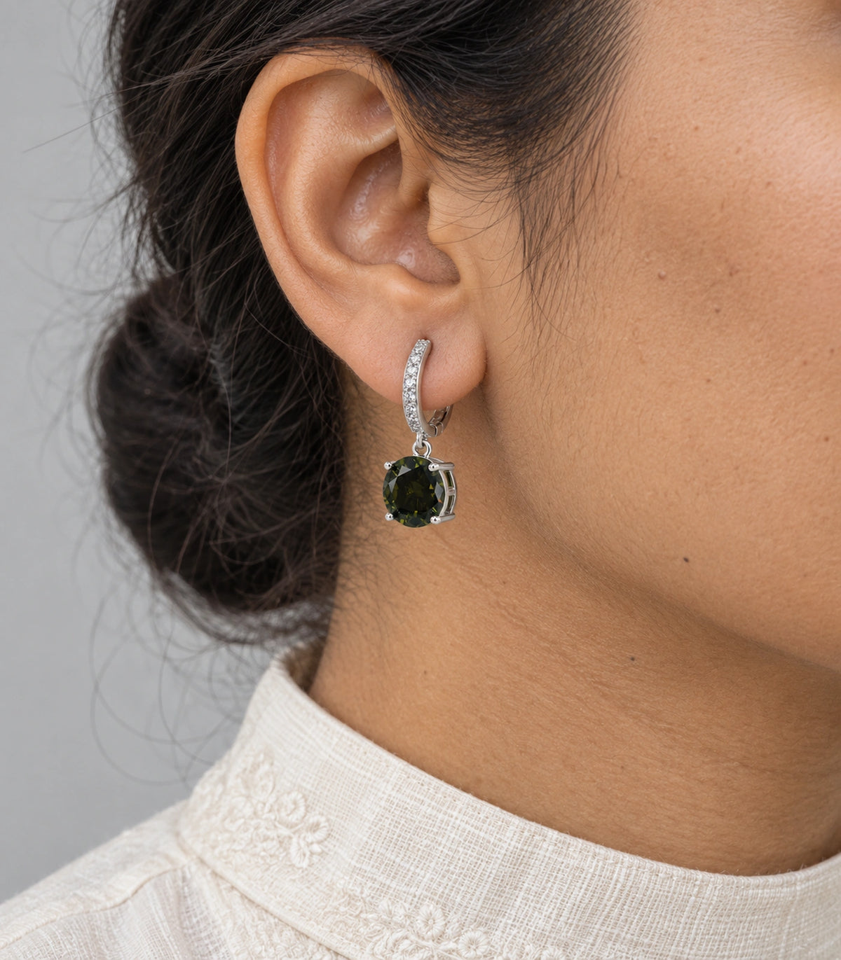 JIMIKI Round Crystal Hoop Drop Earring Pair in Silver tone / dark green, close-up detail #color_silver tone / dark green