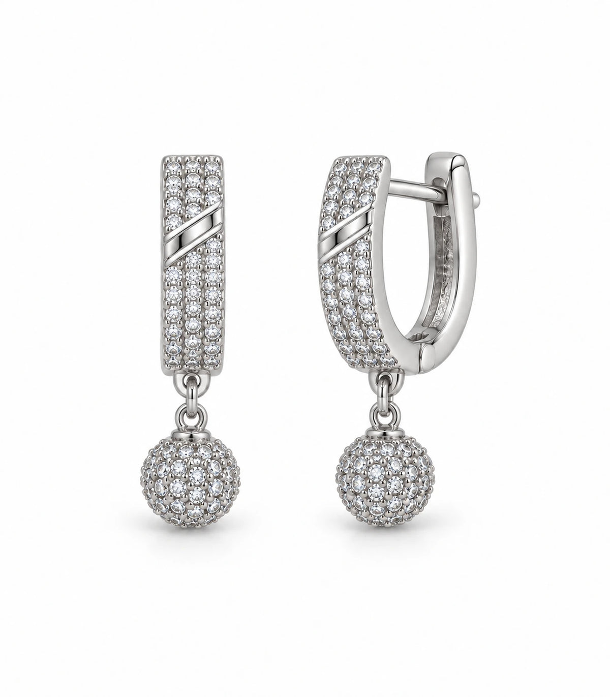 JIMIKI Silver-Tone Diagonal Pavé Ball Drop Huggie Earrings — pair on white background #color_silver-tone / clear