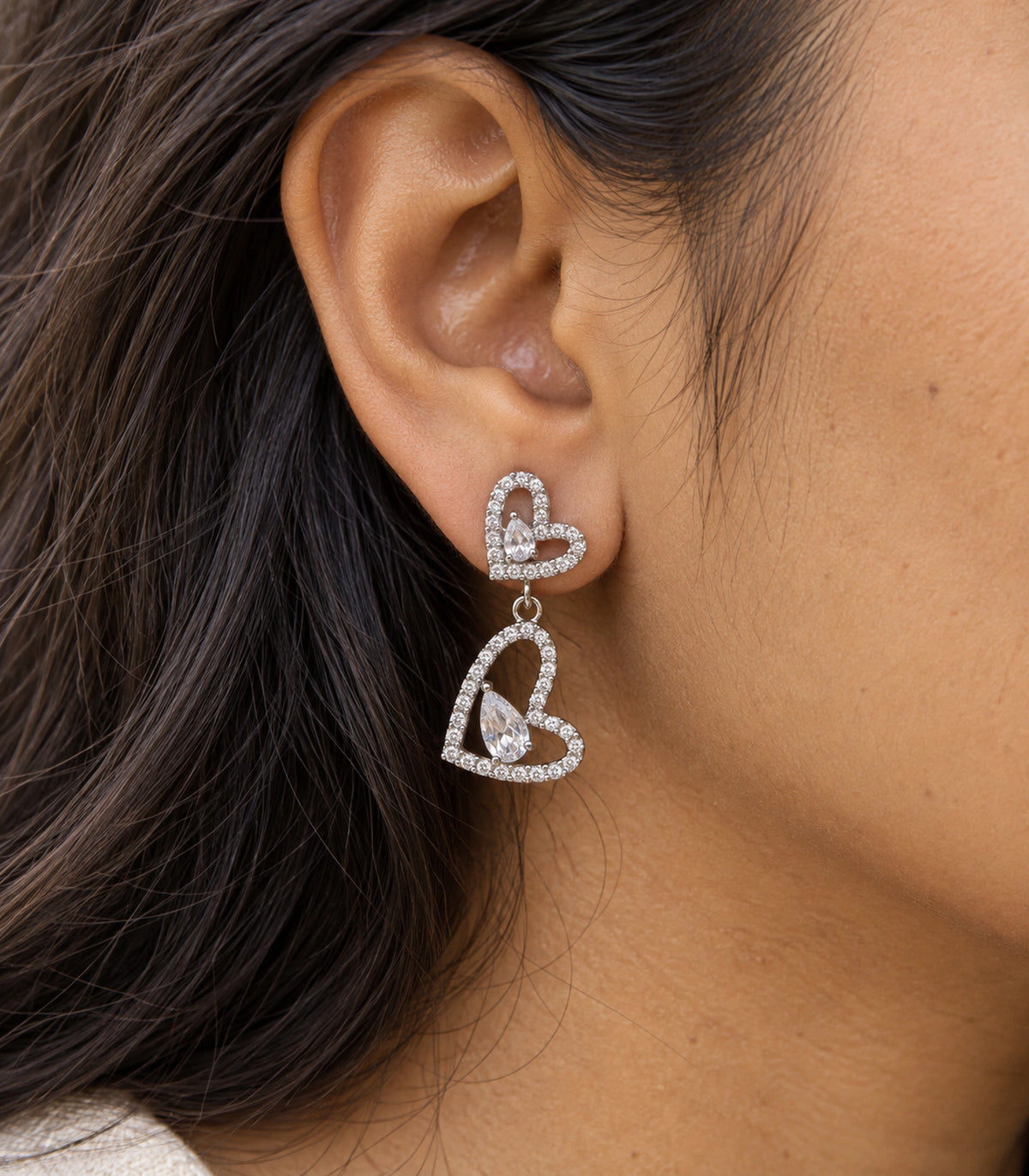 JIMIKI Double Heart Pear Crystal Drop Earrings in Silver Tone, close-up detail #color_silver tone