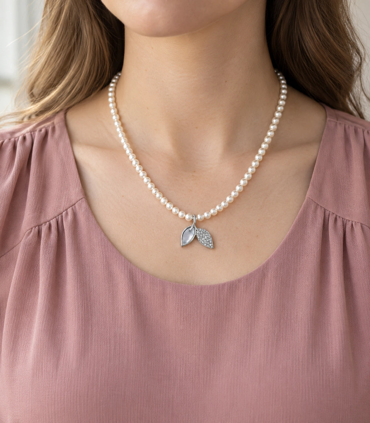 JIMIKI Silver Tone Double Leaf Pearl Style Necklace in Silver tone / white, model wearing view