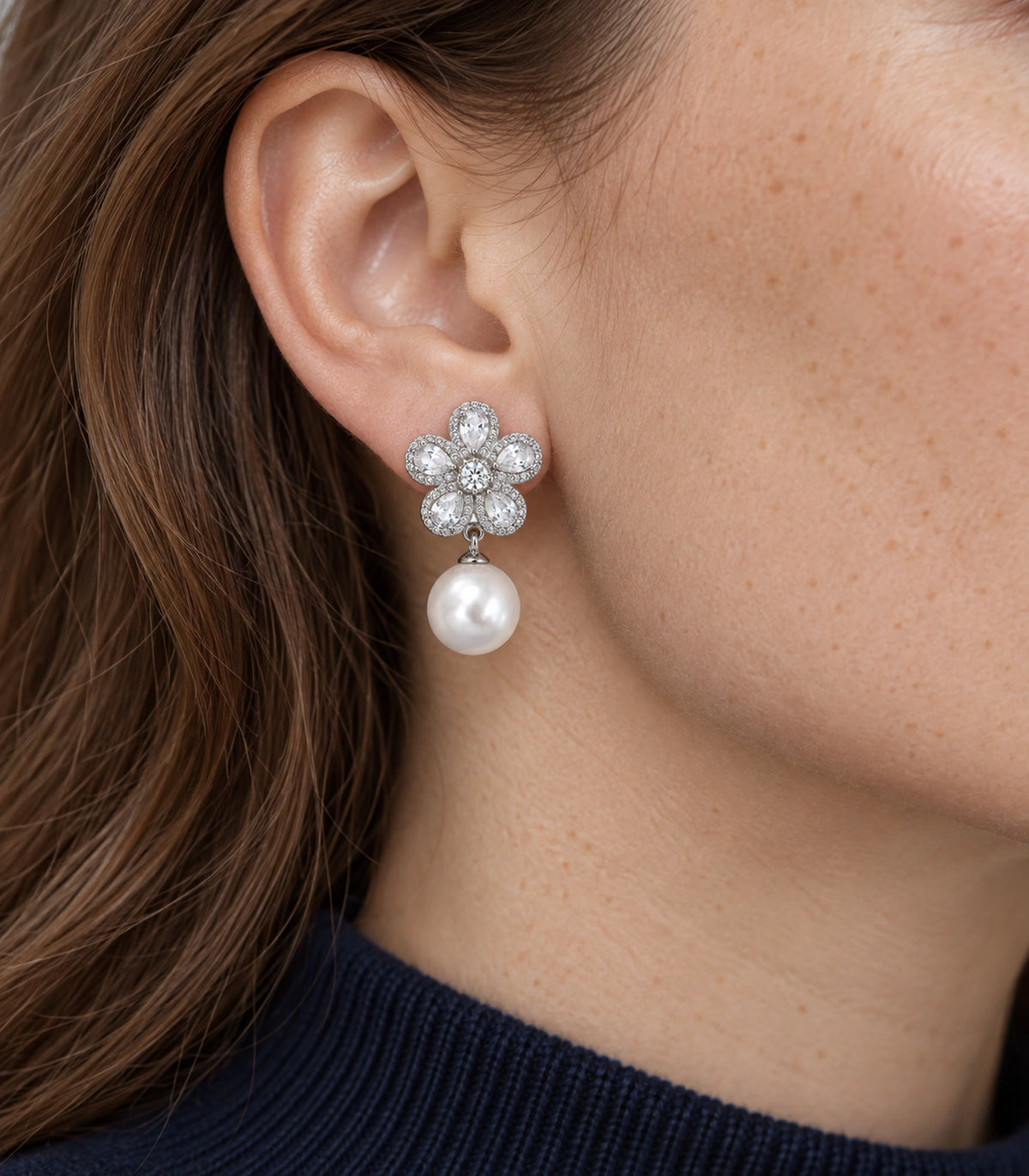 JIMIKI Five Petal Crystal Flower Pearl Drop Earring Pair in Silver-tone, close-up detail #color_silver-tone