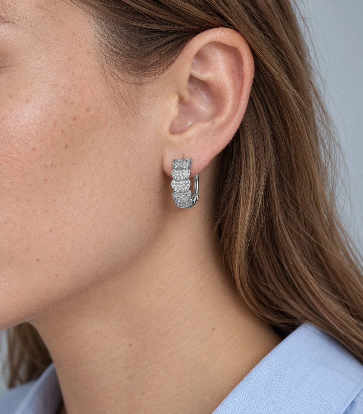 JIMIKI Five Scallop Pave Hinged Hoop Earring Pair in Silver Tone, model wearing view #color_silver tone