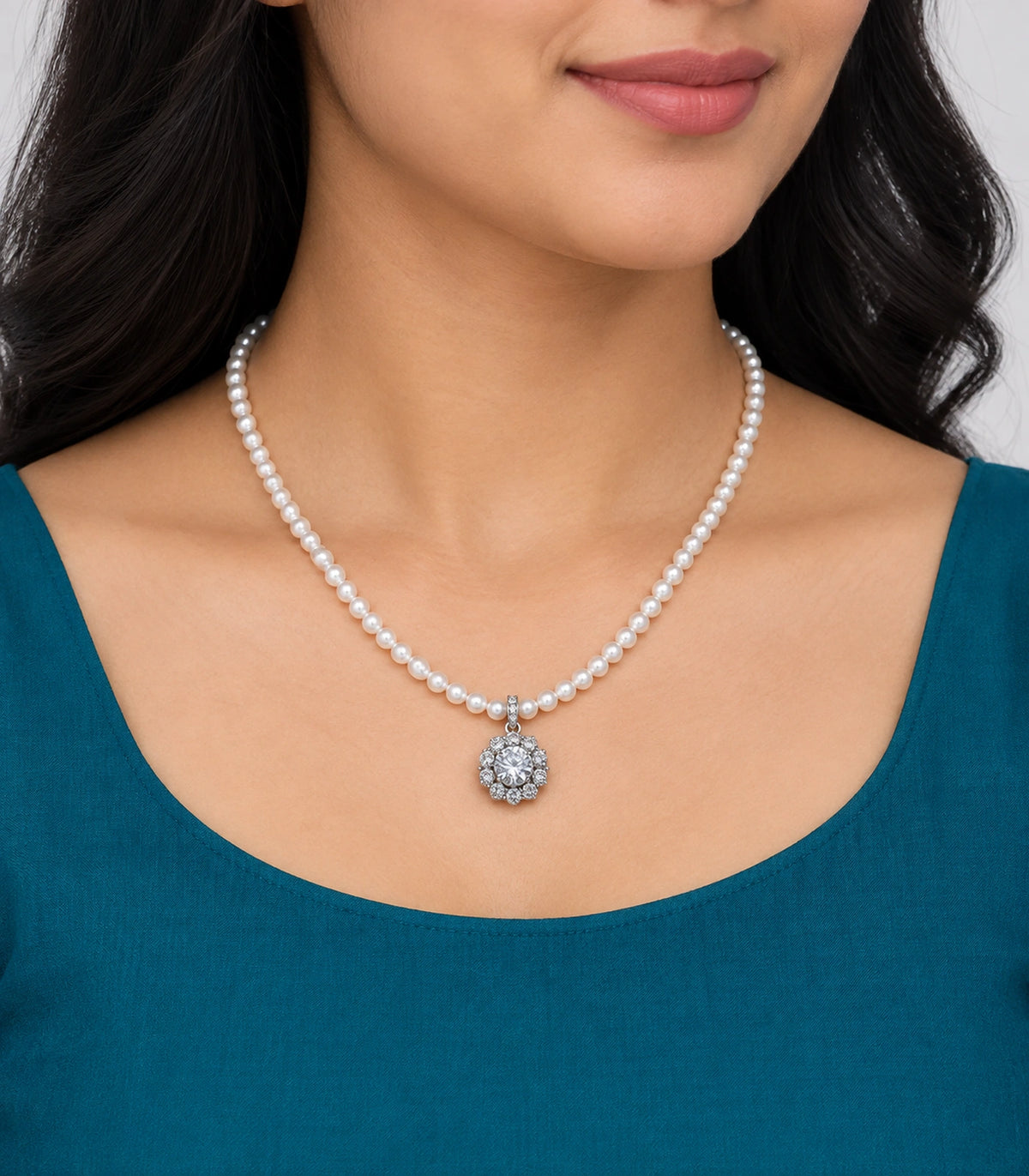 JIMIKI Silver-Tone Floral Cluster Crystal Pearl Necklace in Silver-tone / clear / white, worn with a simple outfit