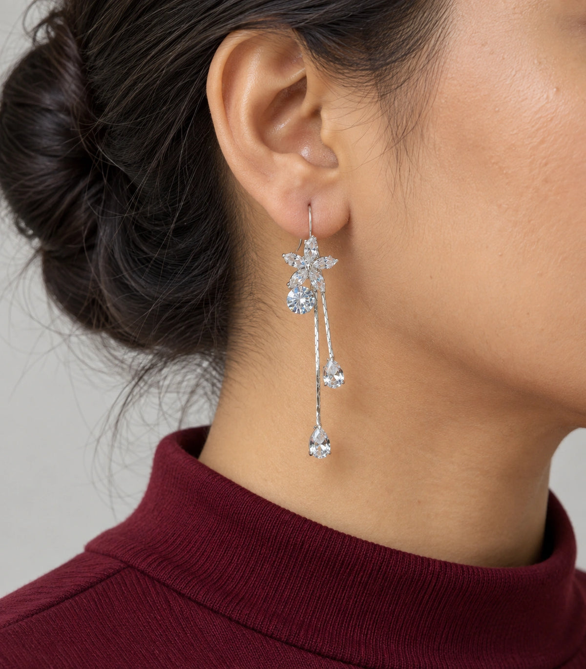 JIMIKI Silver Tone Flower Round Crystal Twin Drop Earring Pair in Silver-tone, model wearing view