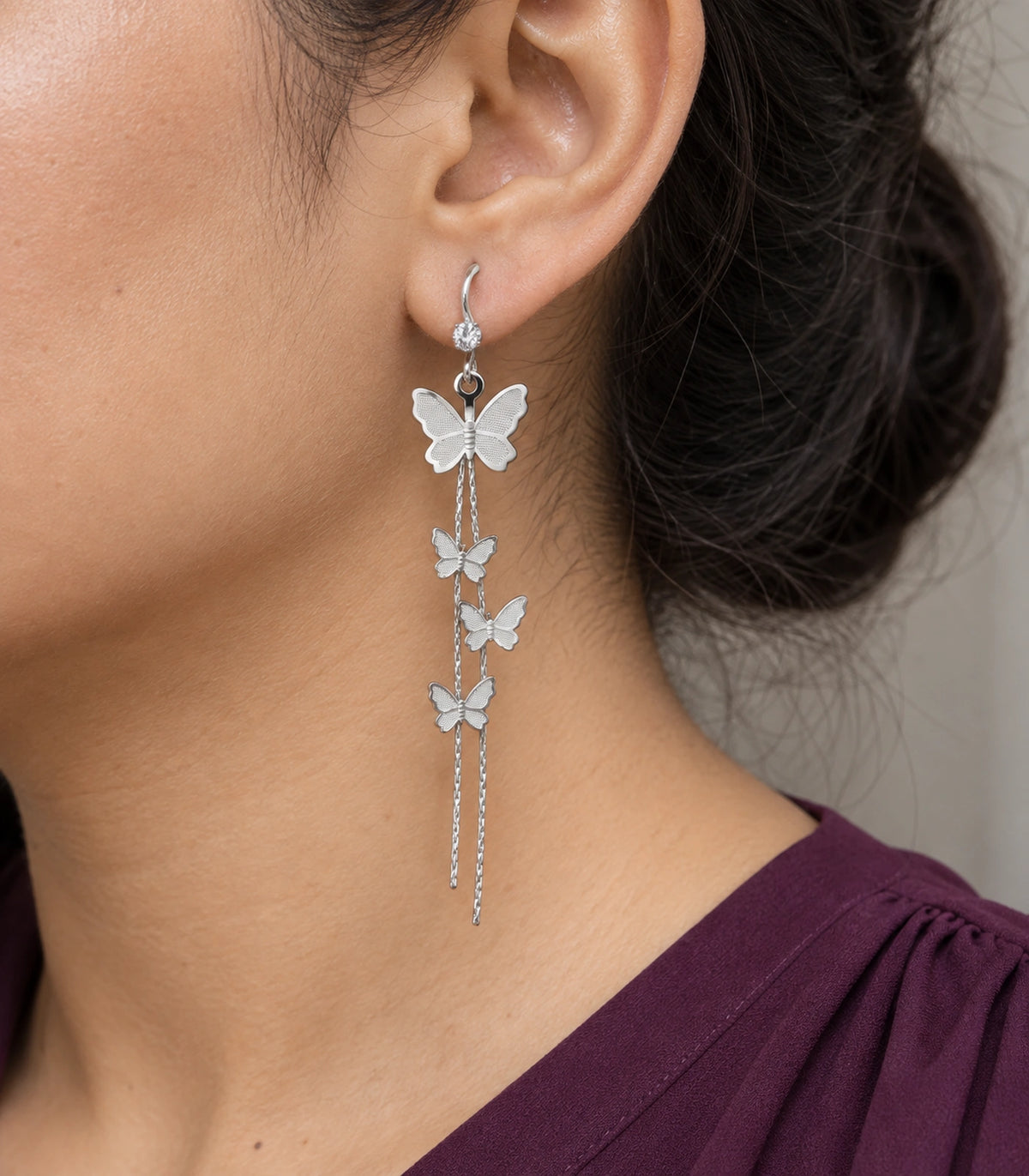 JIMIKI Silver Tone Four Butterfly Chain Earring Pair in Silver-tone, close-up detail
