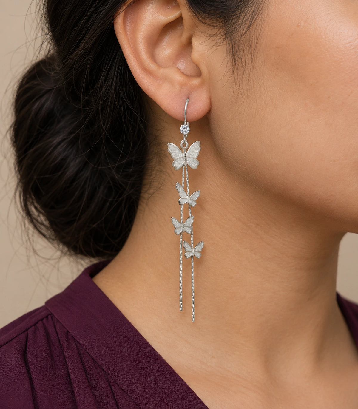 JIMIKI Silver Tone Four Butterfly Chain Earring Pair in Silver-tone, model wearing view