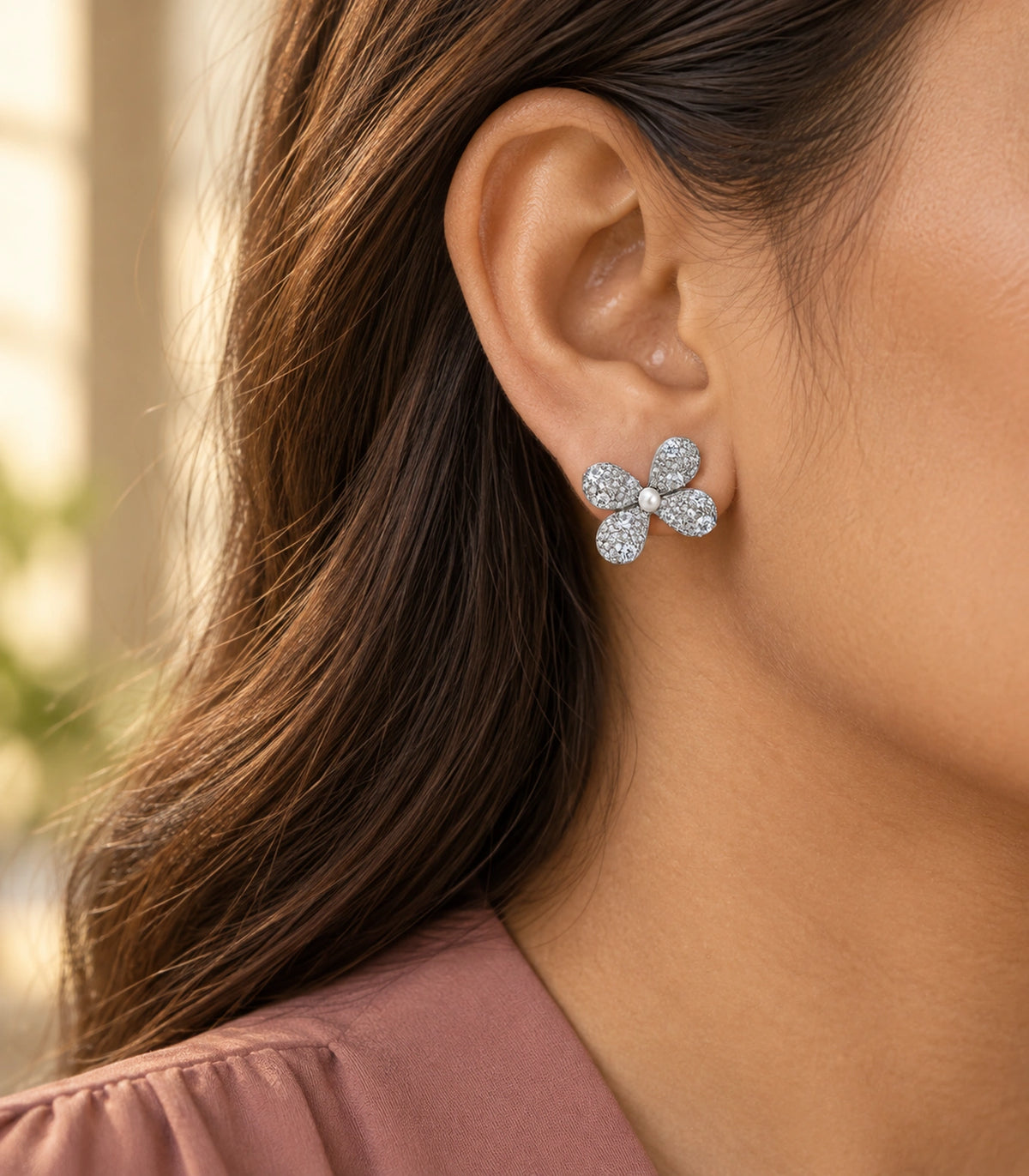 JIMIKI Four Petal Pave Pearl Centre Stud Earring Pair in Silver tone, editorial model view #color_silver tone