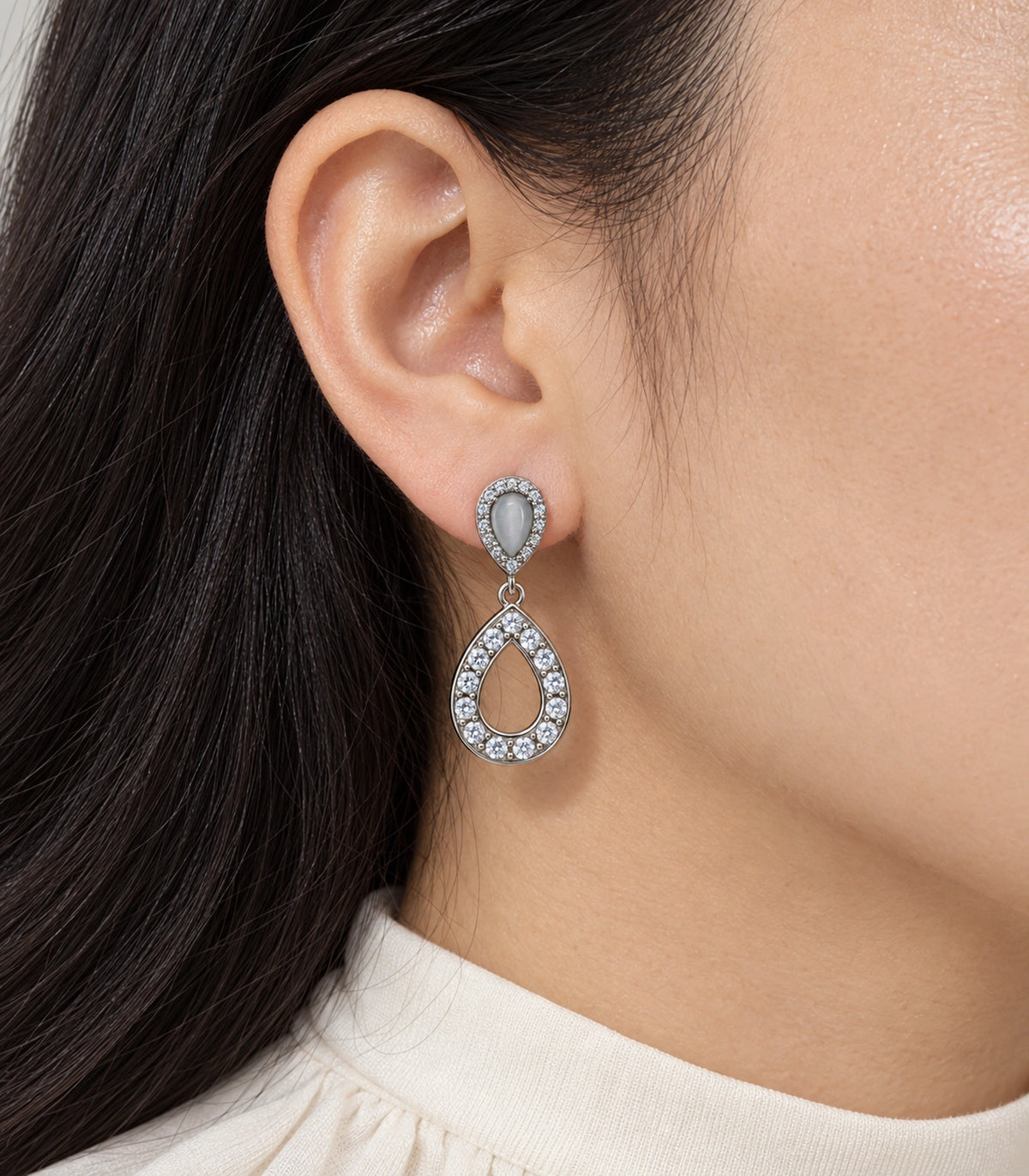 JIMIKI Silver-Tone Grey Teardrop Crystal Halo Drop Earring Pair in Silver Tone, close-up detail