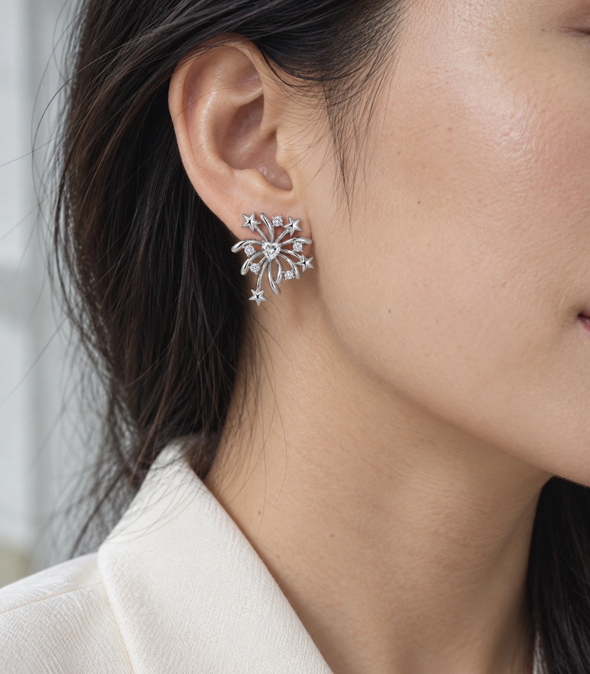 JIMIKI Heart Crystal Starburst Stud Earring Pair in Silver tone/Clear, editorial model view #color_silver tone/clear