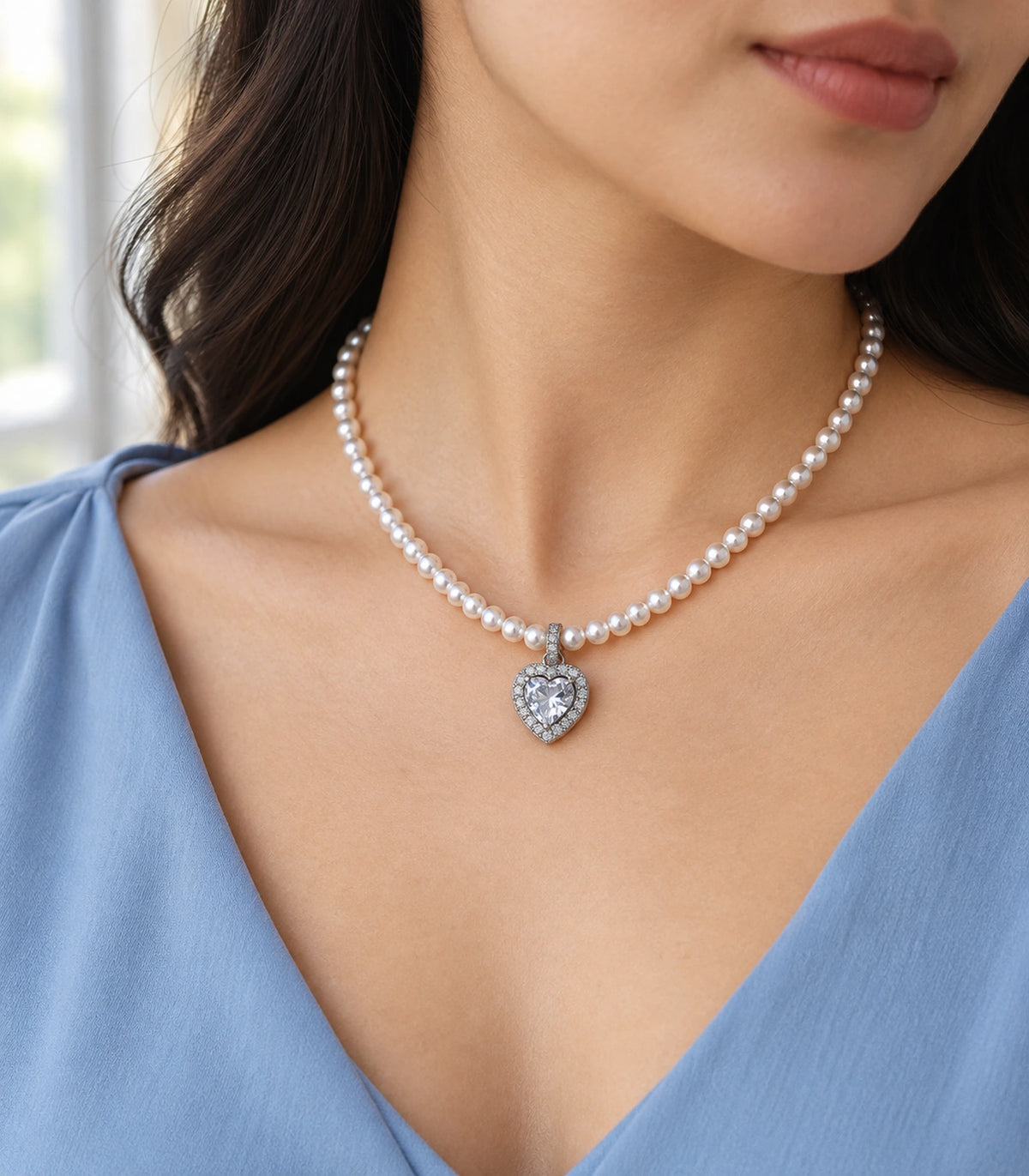 JIMIKI Silver Tone Heart Halo Crystal Pearl Style Necklace in Silver / White, editorial model view